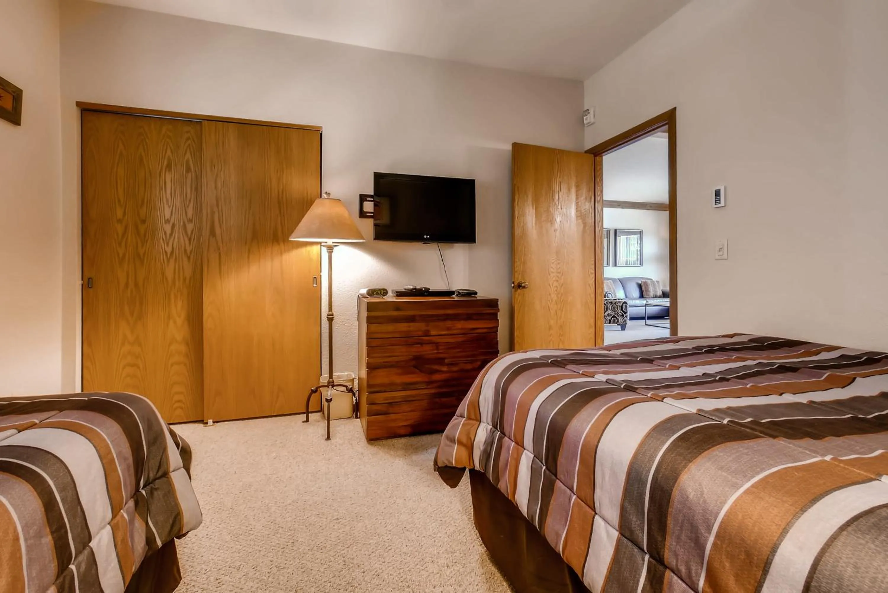 Living room, Bed in Snow Flower Condos