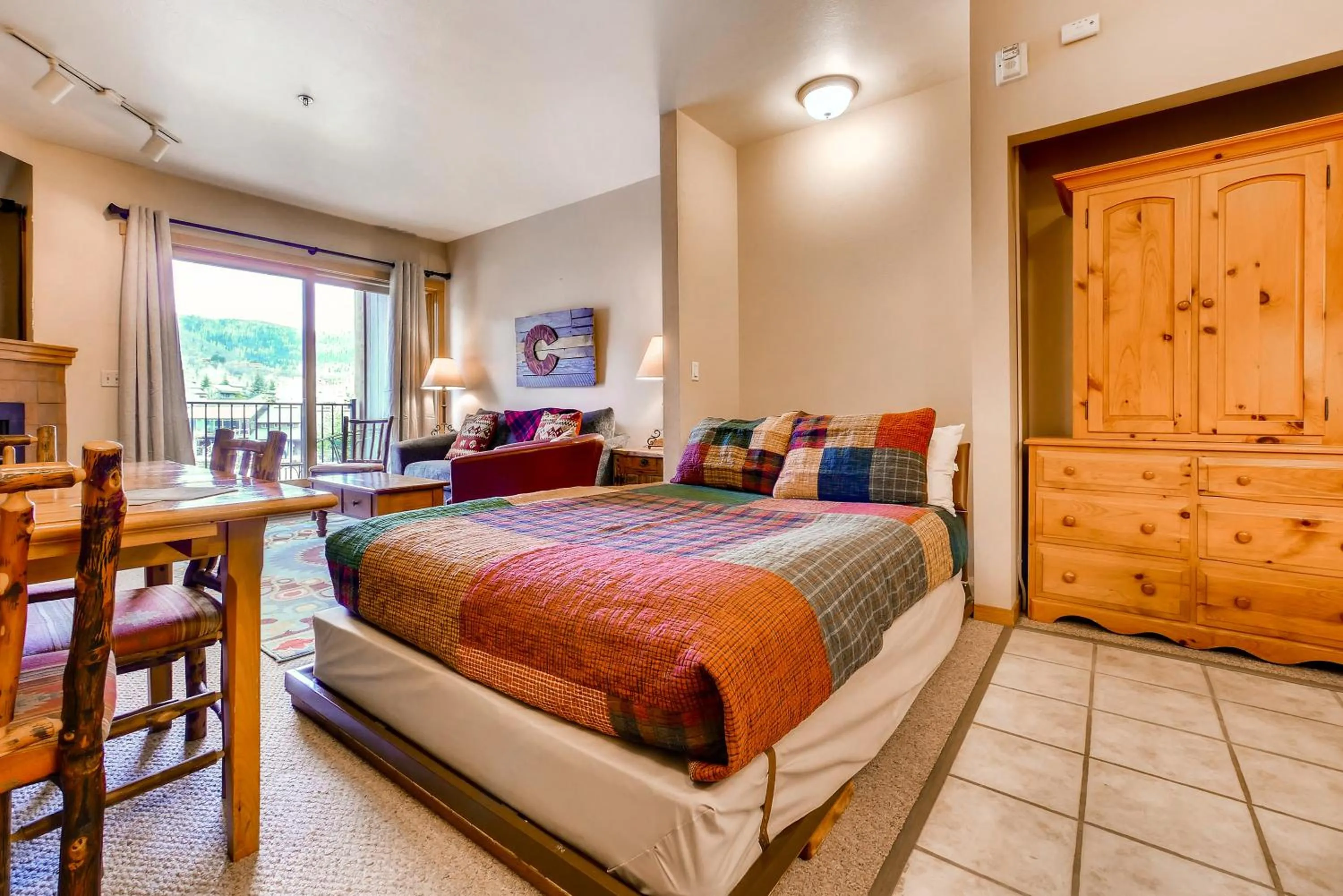 Dining area, Bed in Snow Flower Condos