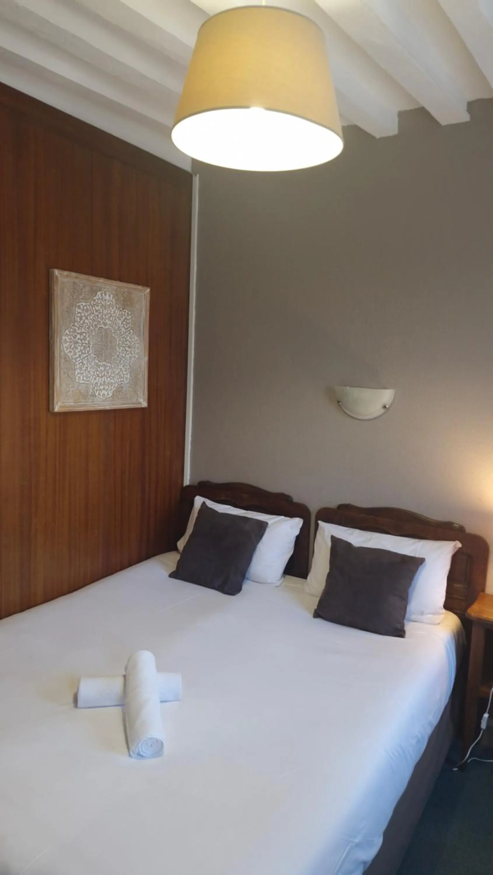 Photo of the whole room, Bed in Hotel Saint Etienne