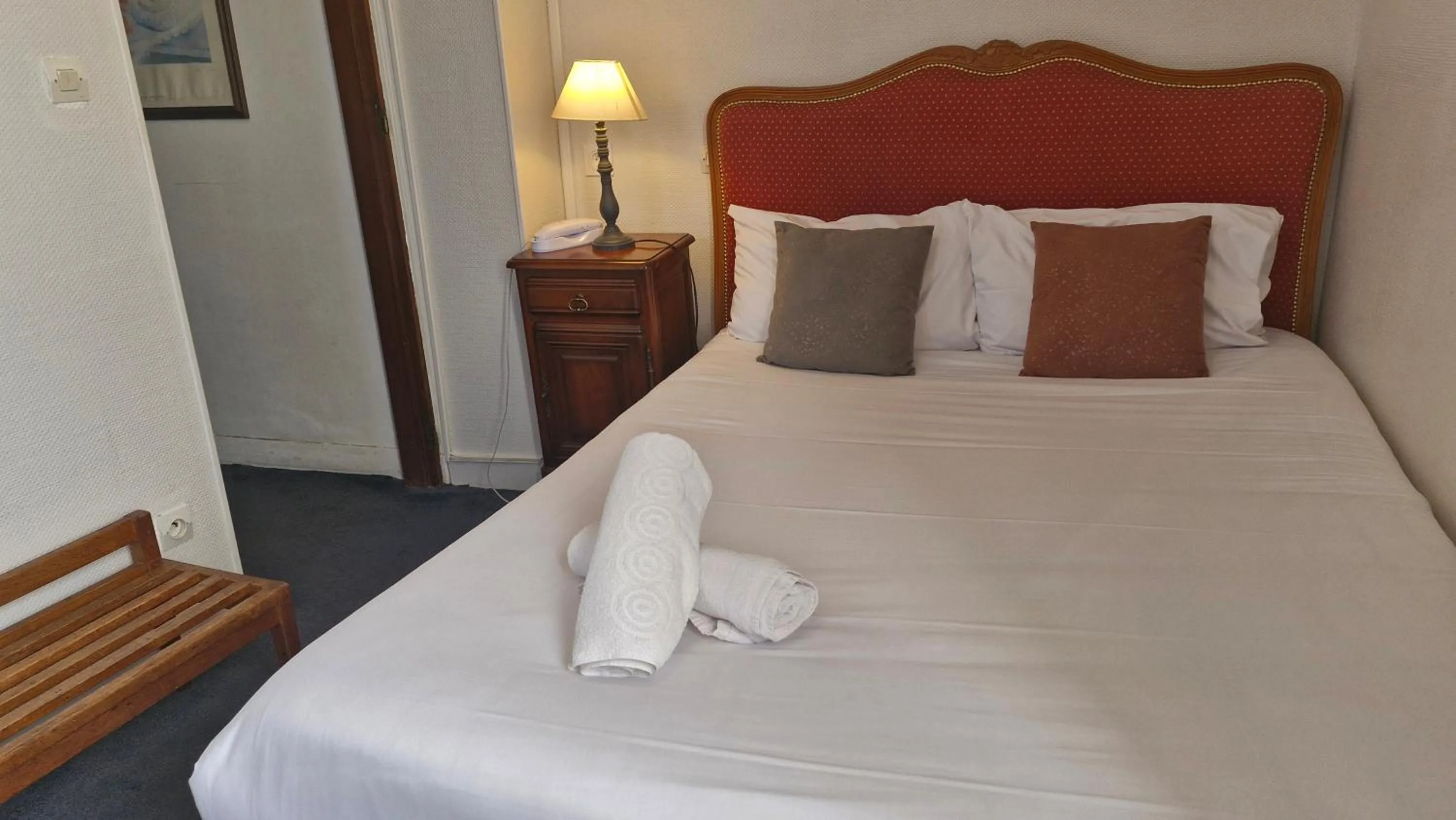 Photo of the whole room, Bed in Hotel Saint Etienne