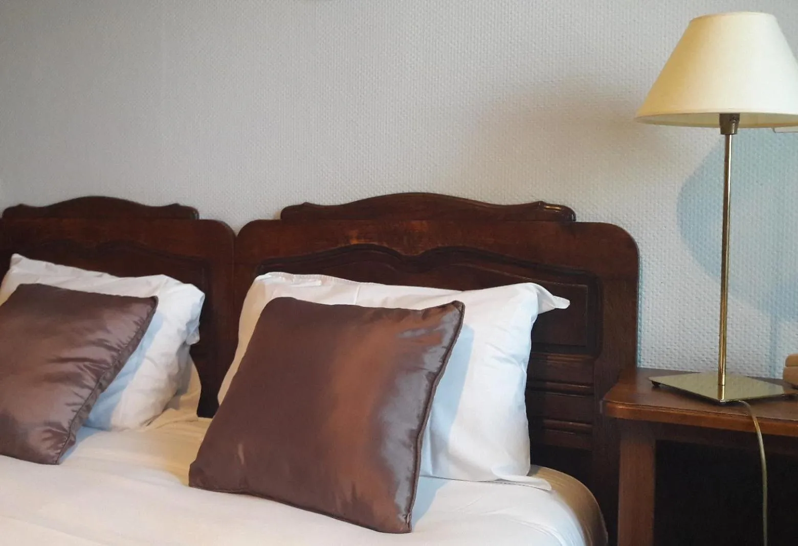 Bed in Hotel Saint Etienne