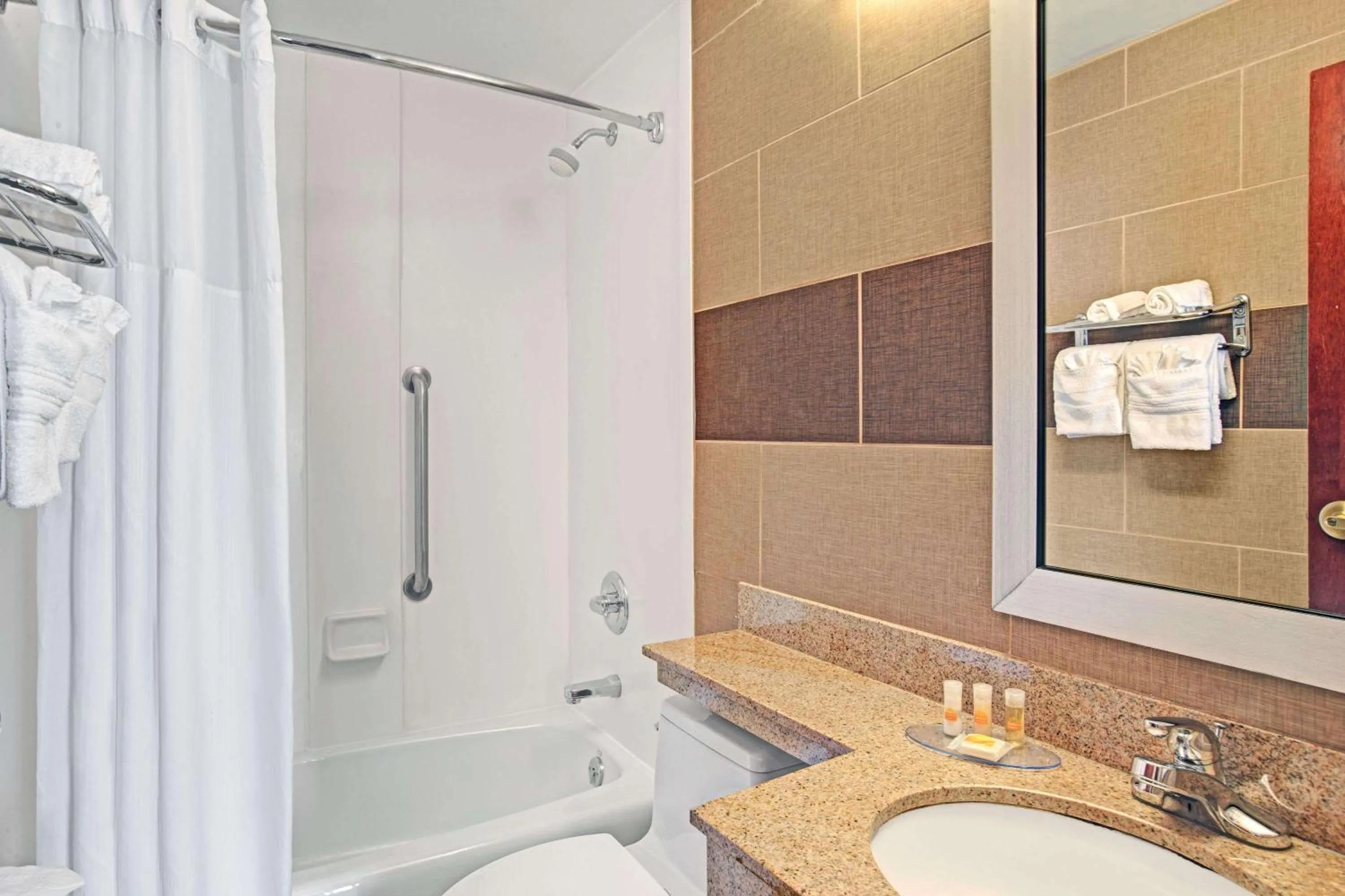 Bathroom in Days Inn by Wyndham Brooklyn