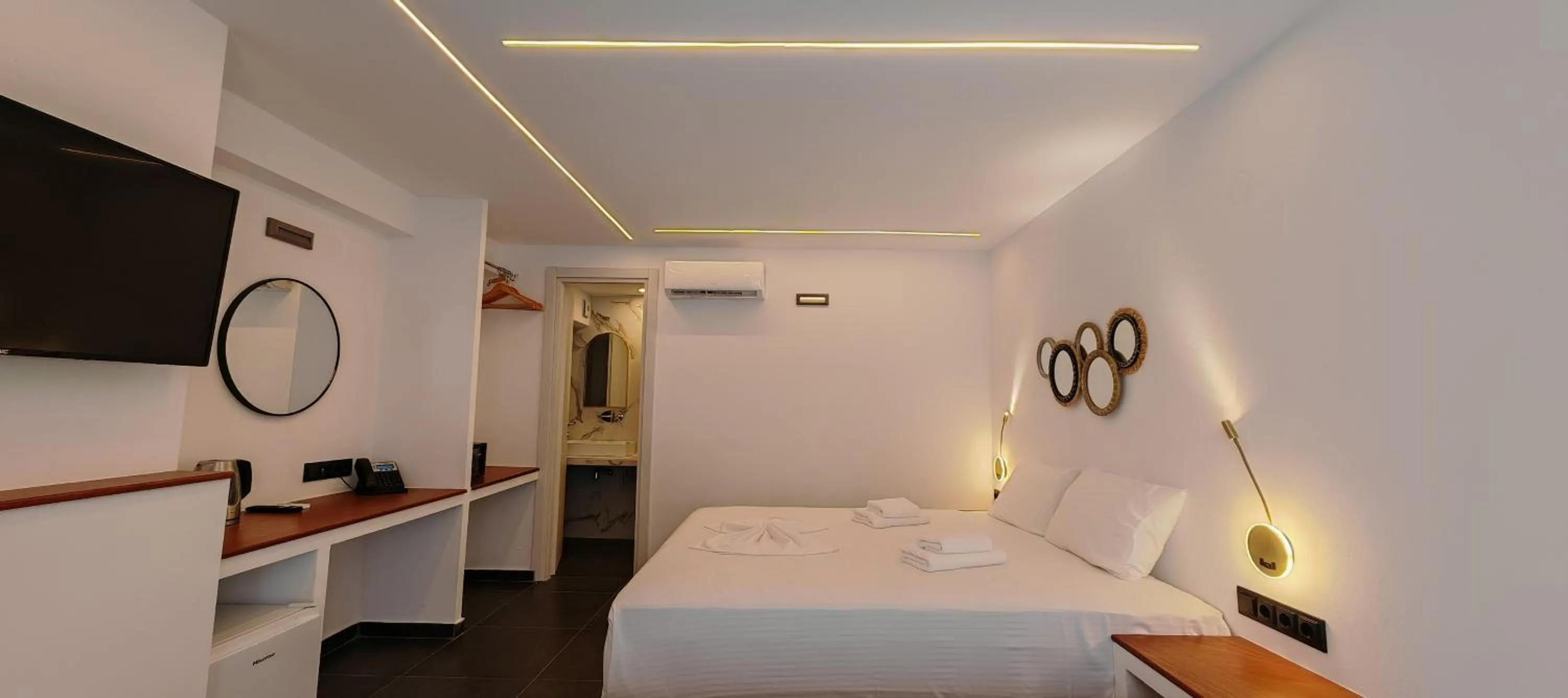 Bed in Rigas Hotel Skopelos