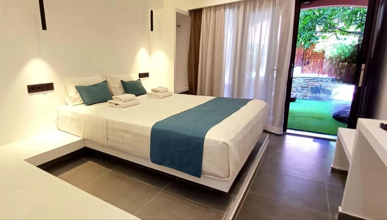 Bed in Rigas Hotel Skopelos