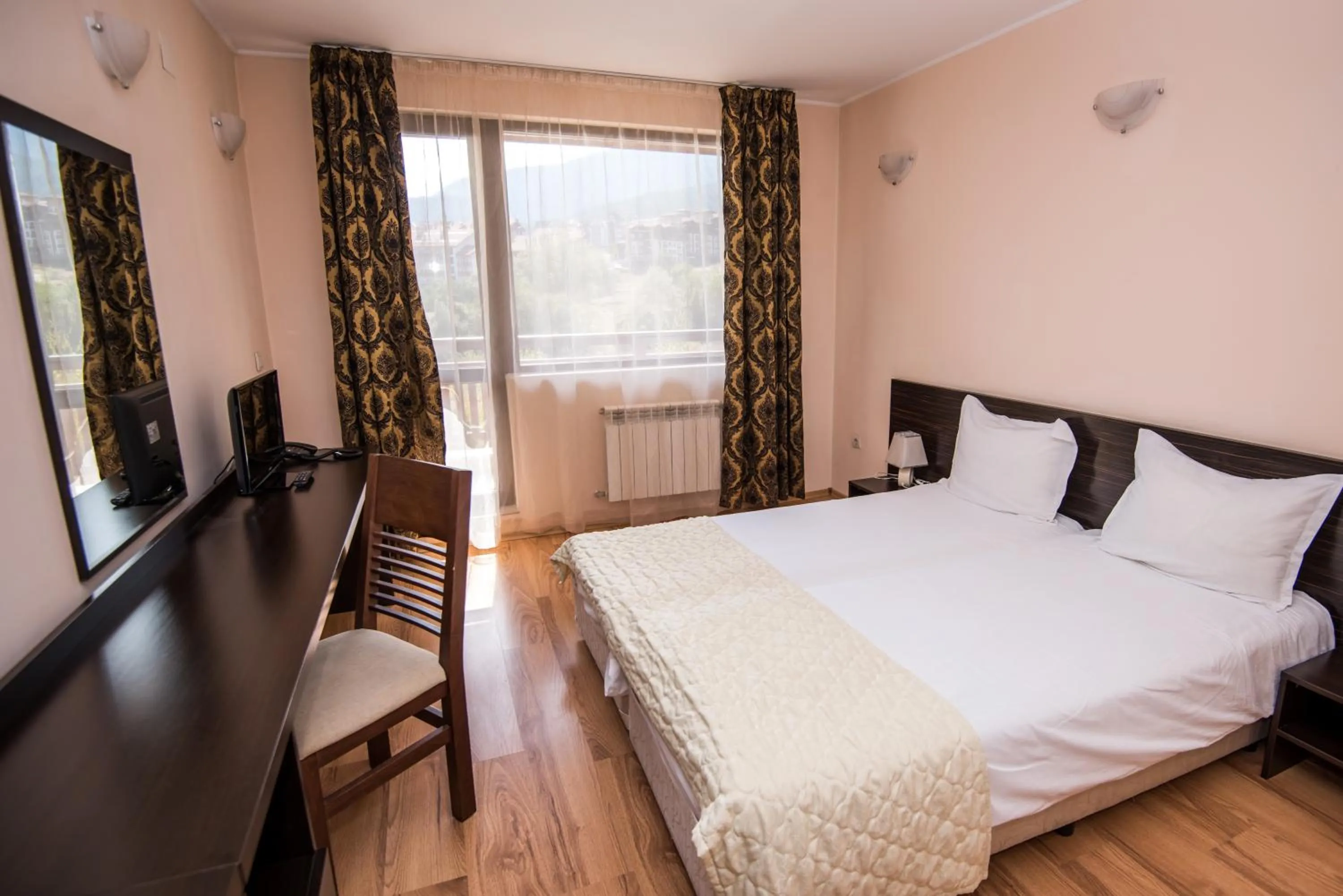 Bed in Apart Hotel Orbilux