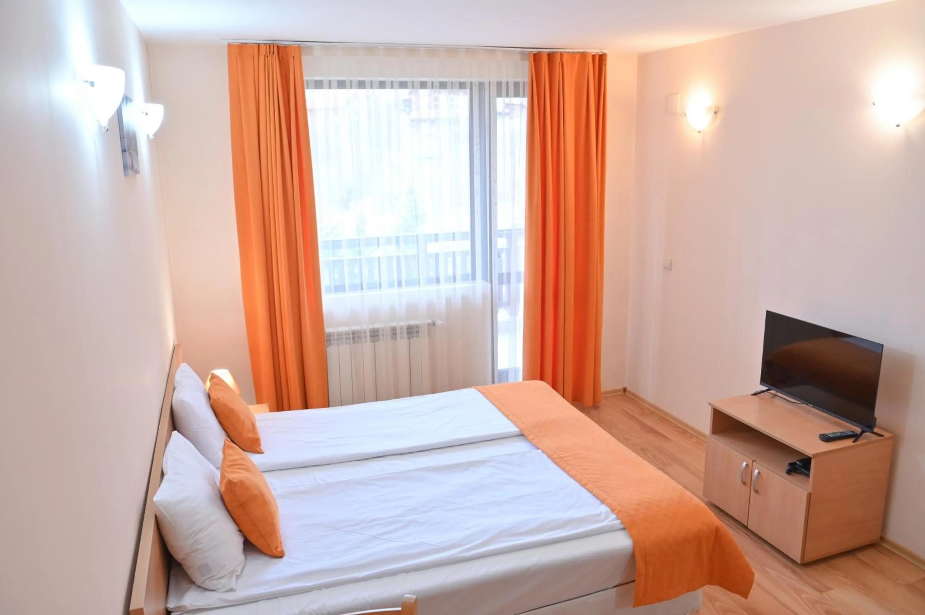 Bed in Apart Hotel Orbilux