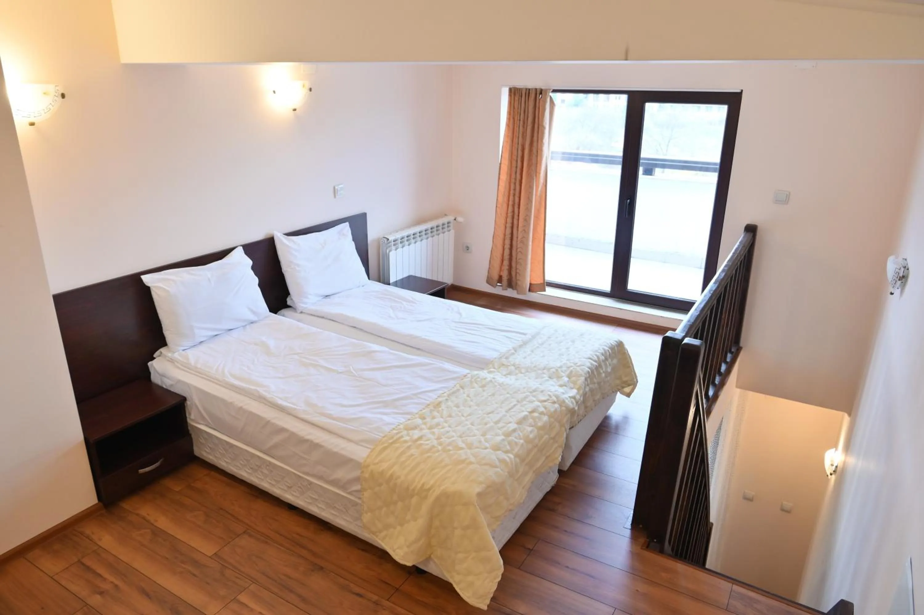 Bed in Apart Hotel Orbilux