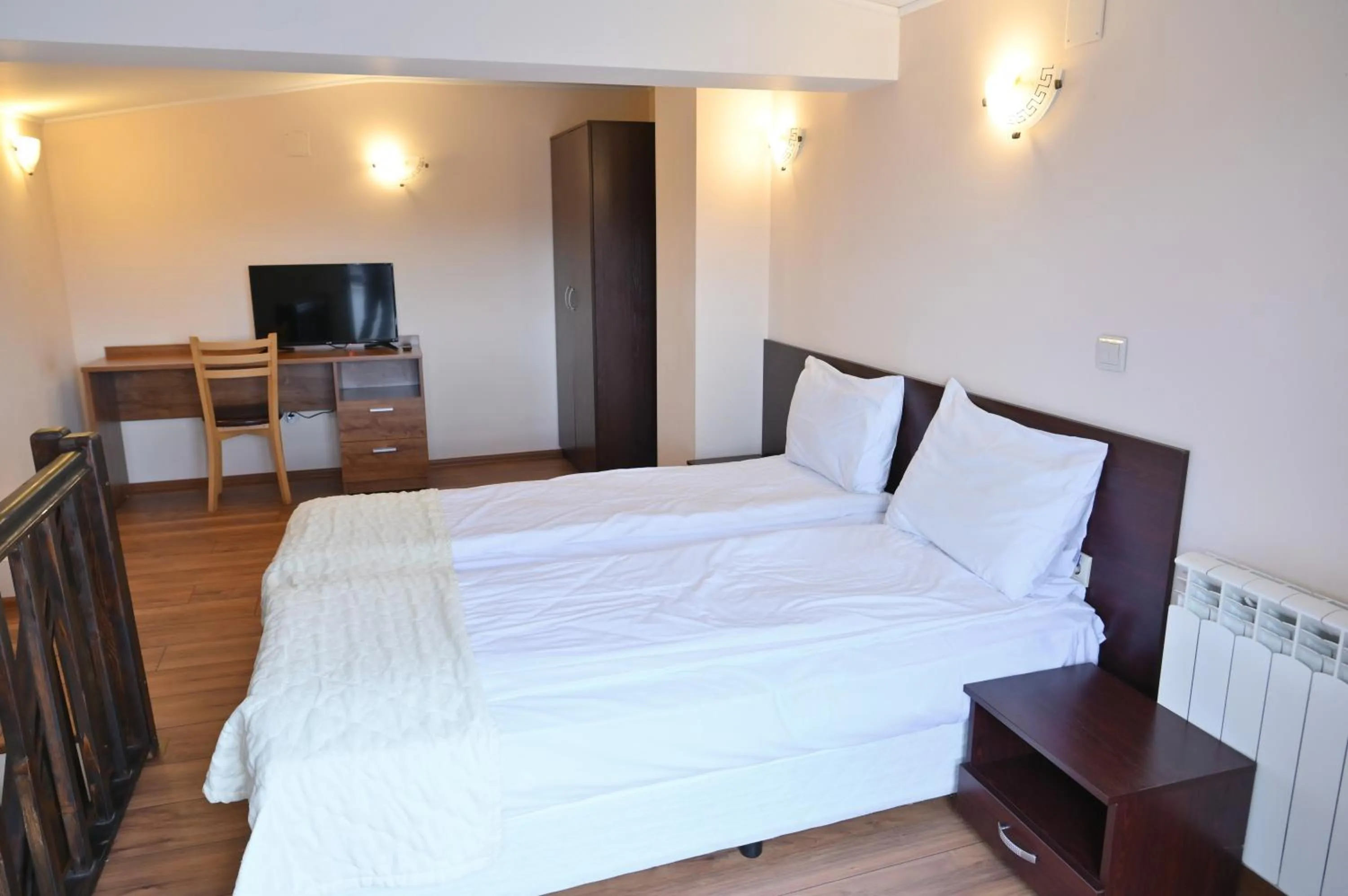 Bed in Apart Hotel Orbilux