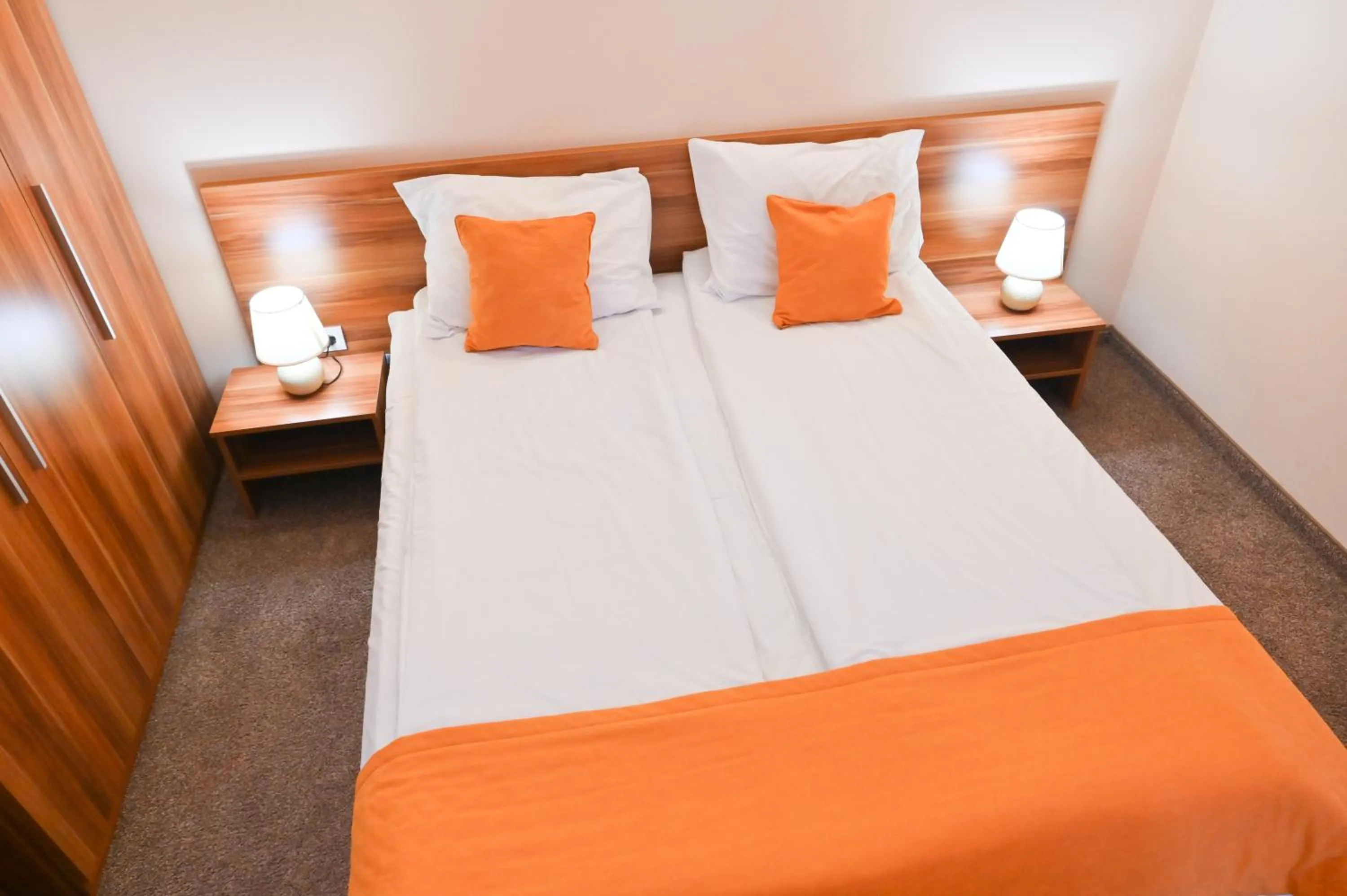 Bed in Apart Hotel Orbilux