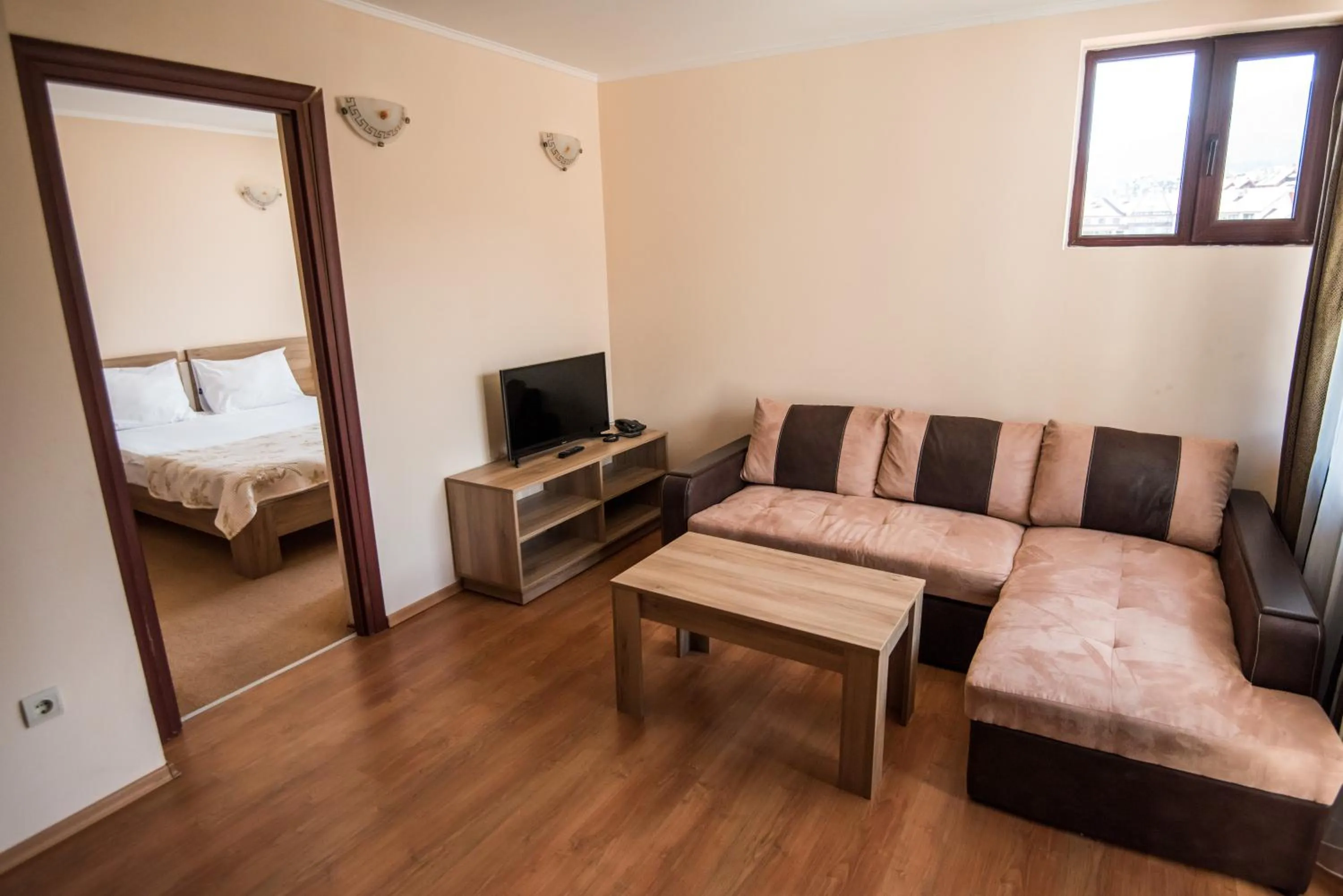 Seating area, Bed in Apart Hotel Orbilux