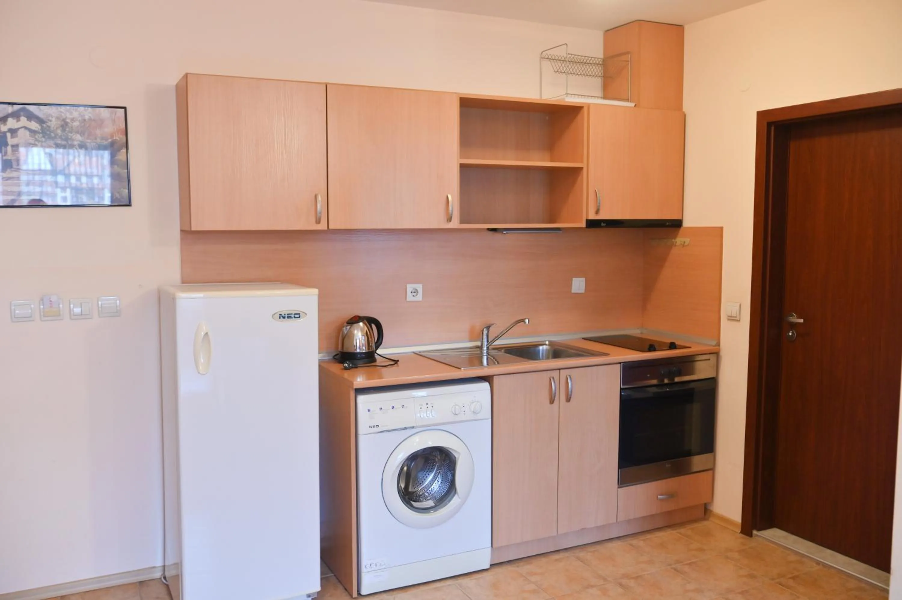 Kitchen or kitchenette in Apart Hotel Orbilux