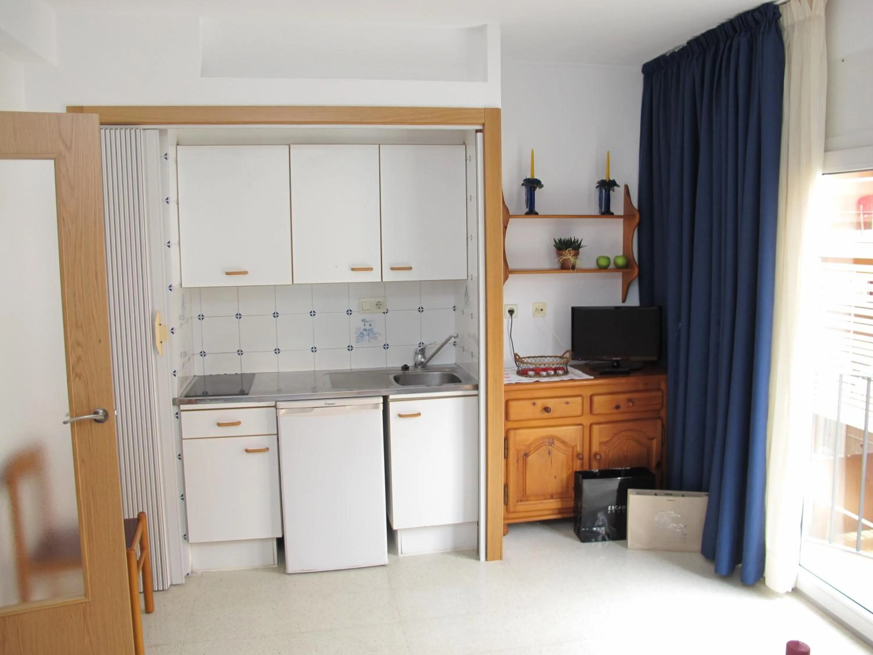 Kitchen or kitchenette in Apartamentos Santi