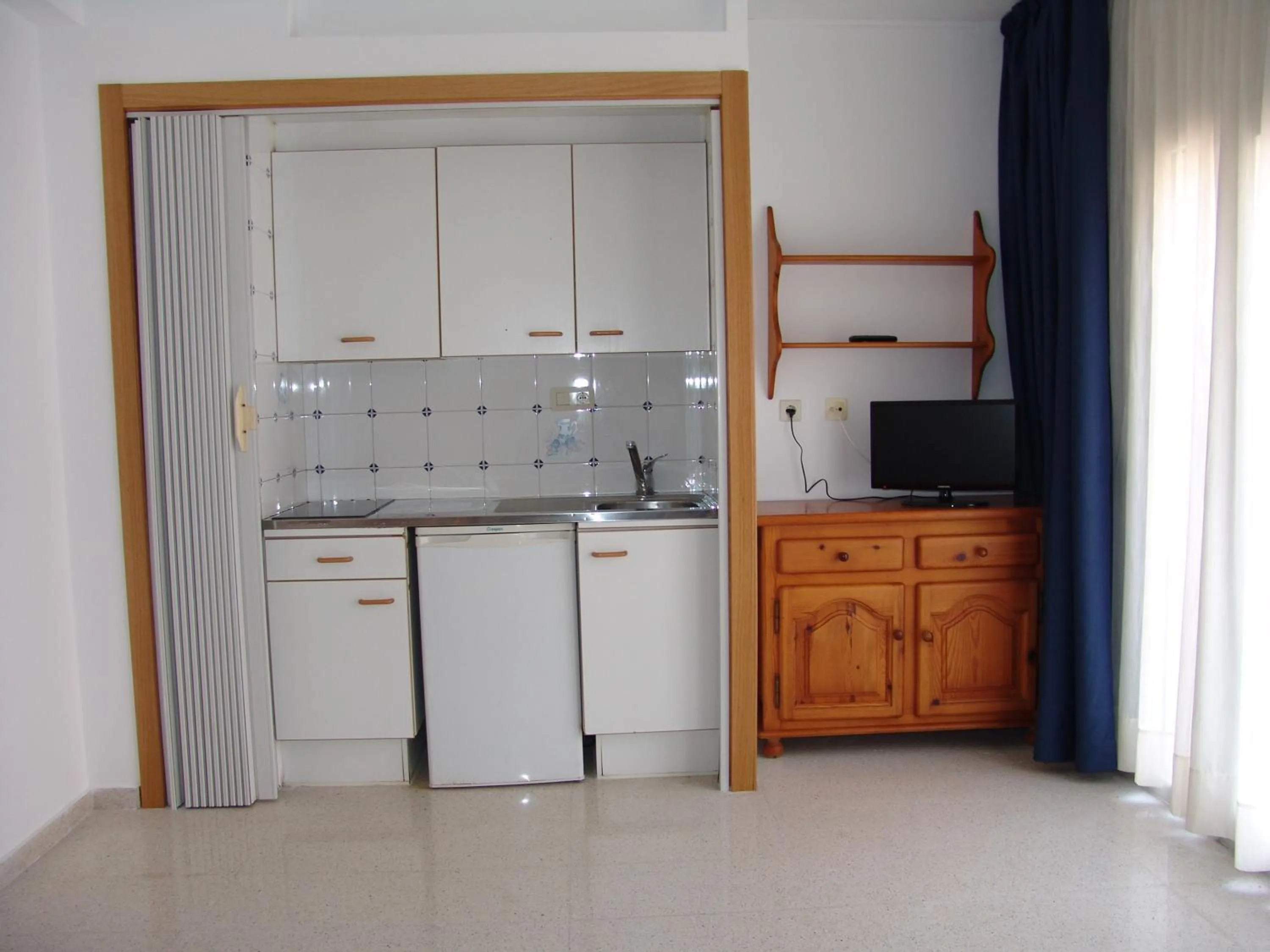 Kitchen or kitchenette in Apartamentos Santi