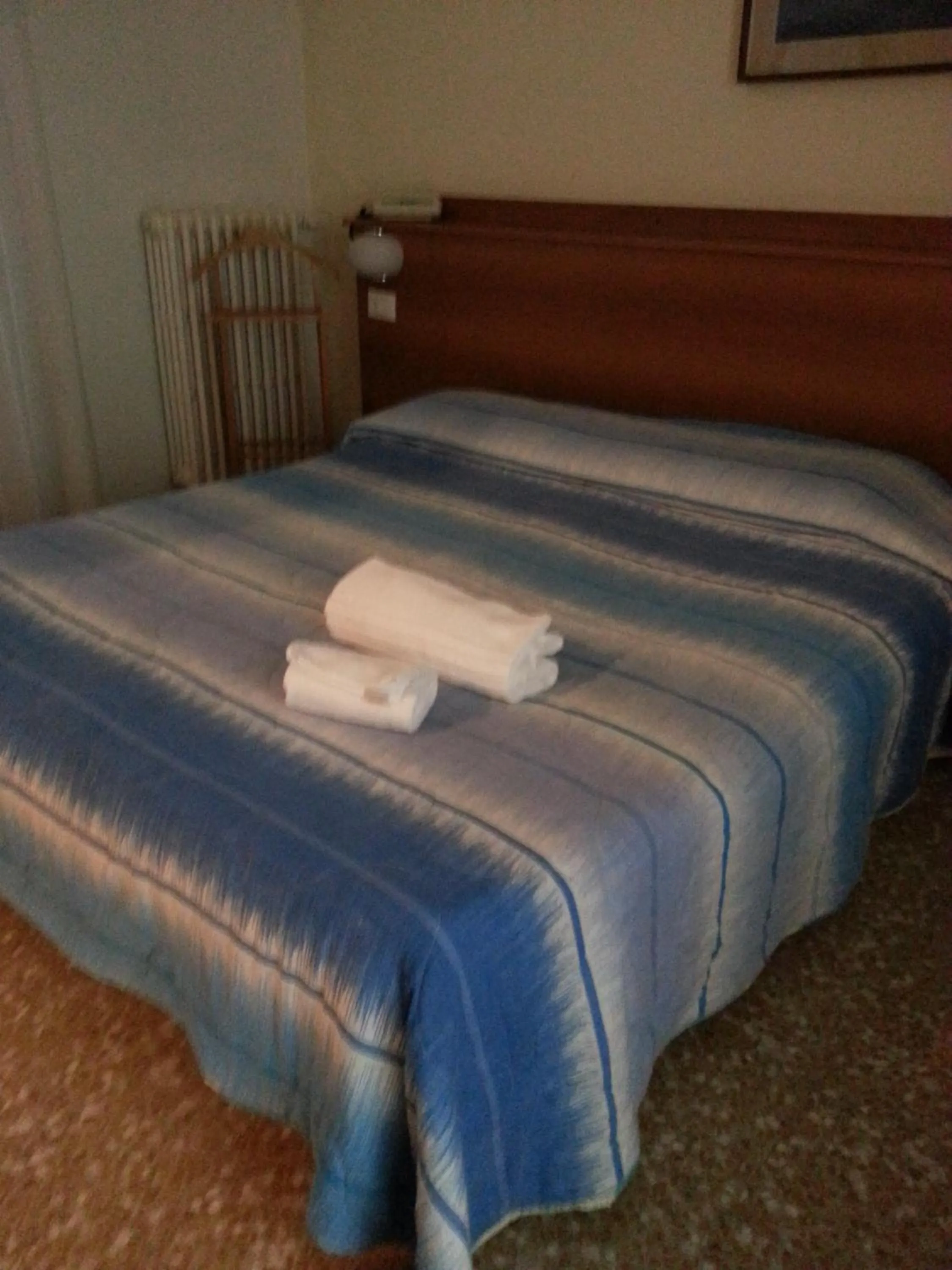 Bed in Hotel Lombardia