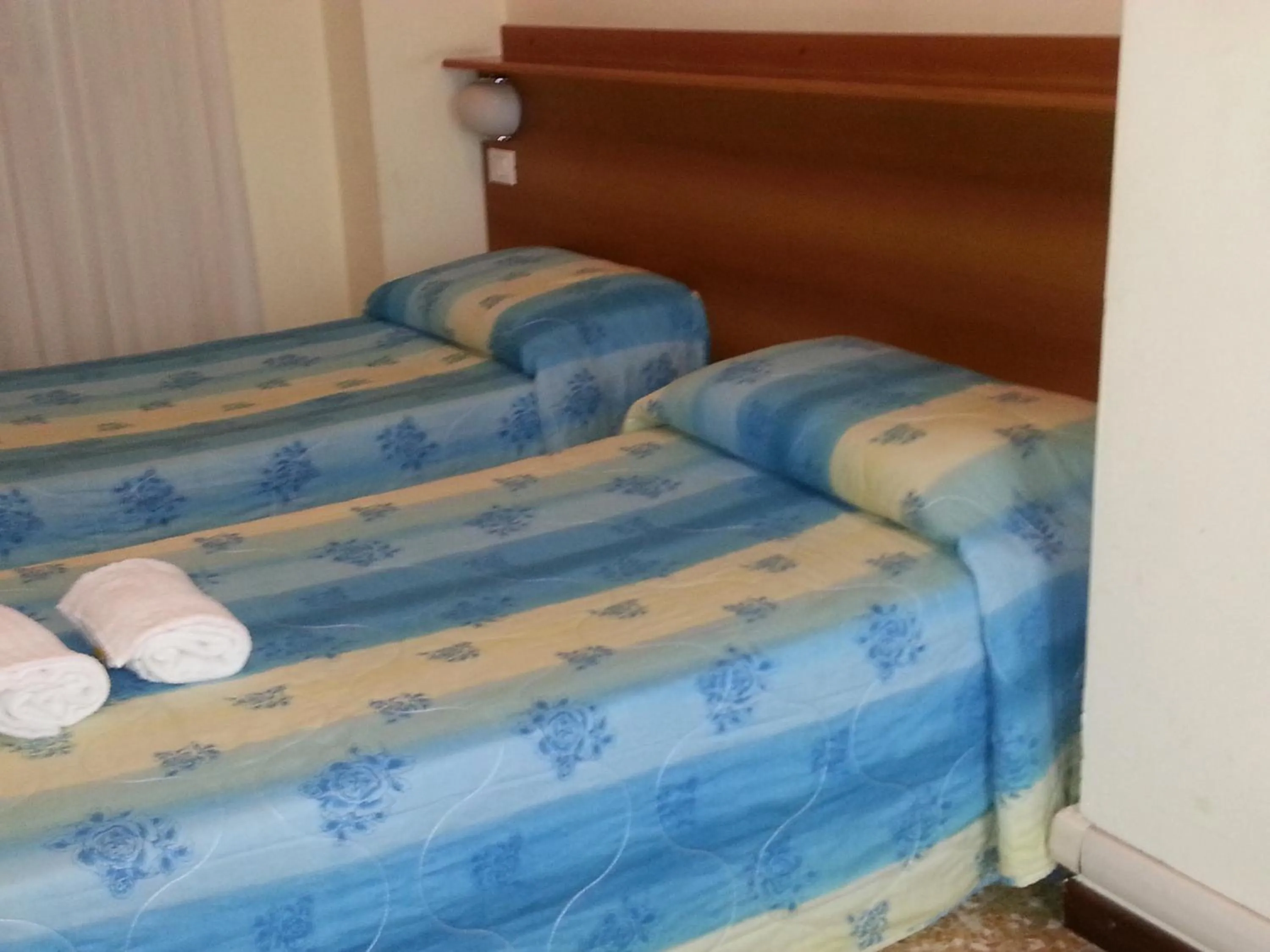 Bed in Hotel Lombardia