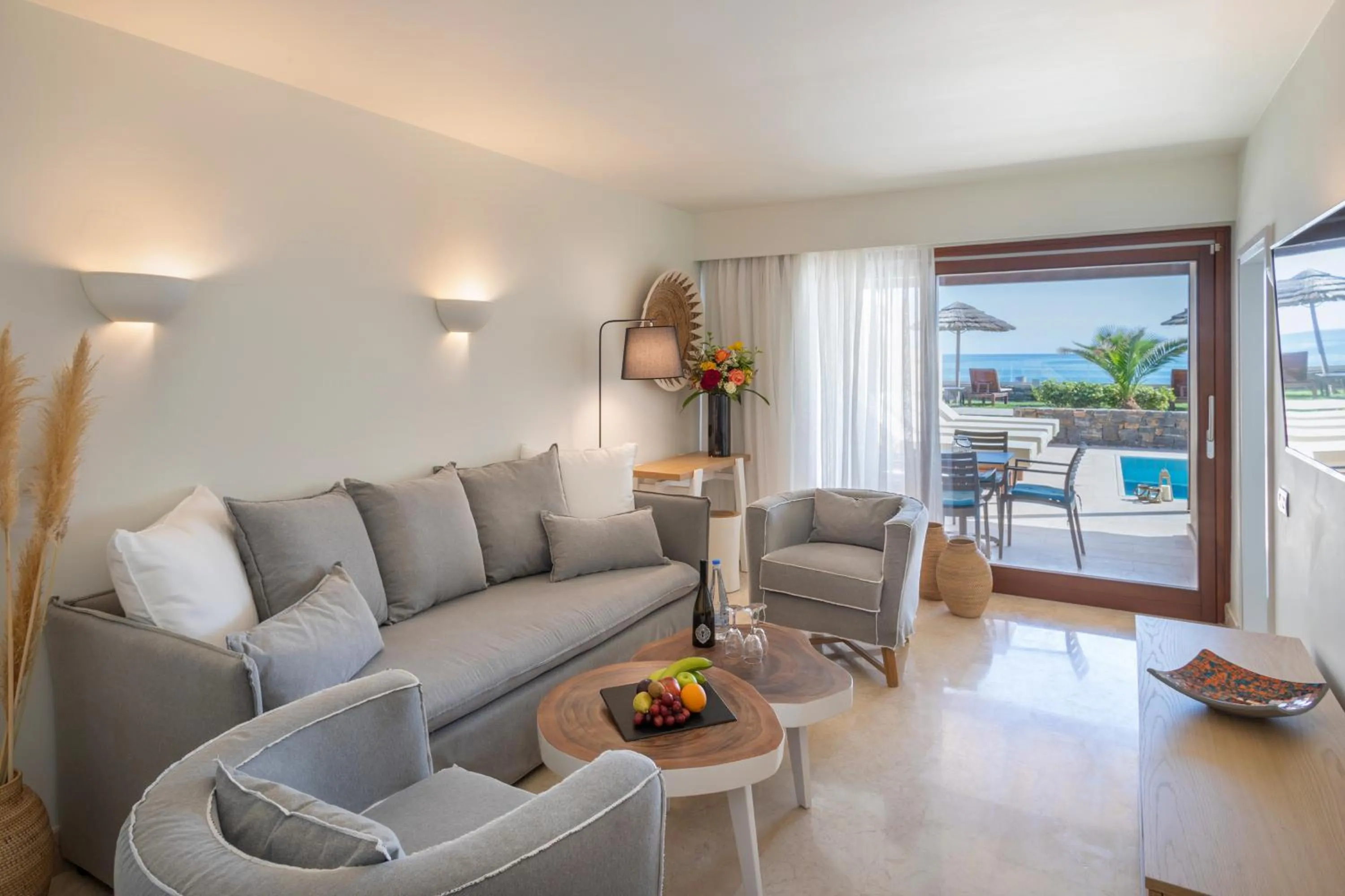 Living room in Blue Sea Beach Affiliated By Melia