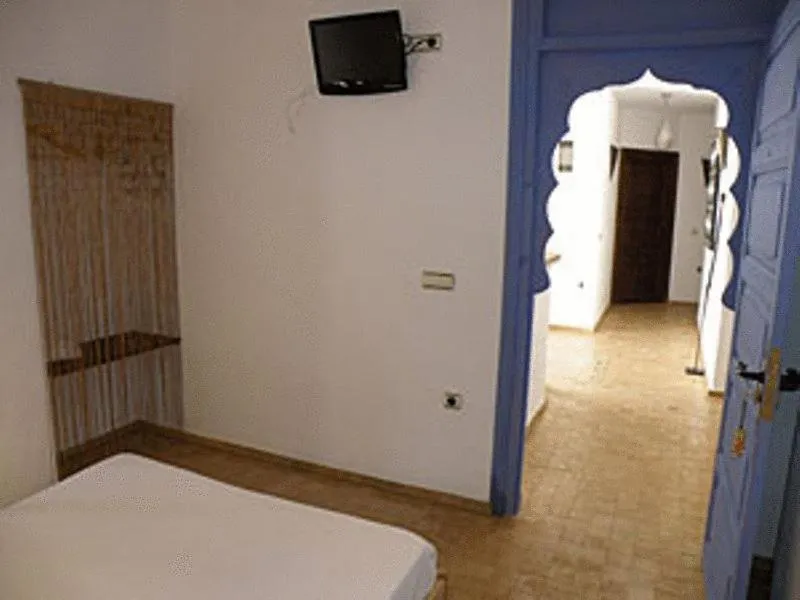 Photo of the whole room, Bed in Hostal Extramuros