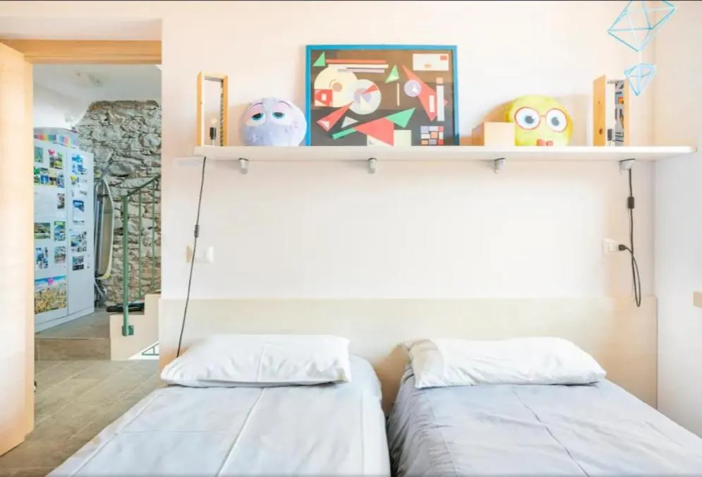 Bed in Foresteria B&B Vecchiascuola Pianazzola