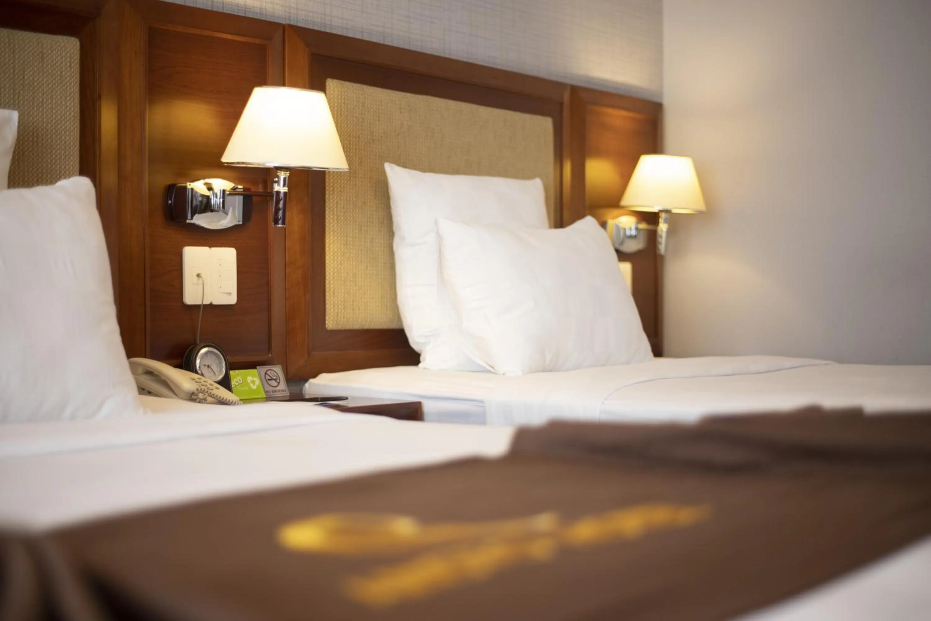 Bed in Aristo Saigon Hotel