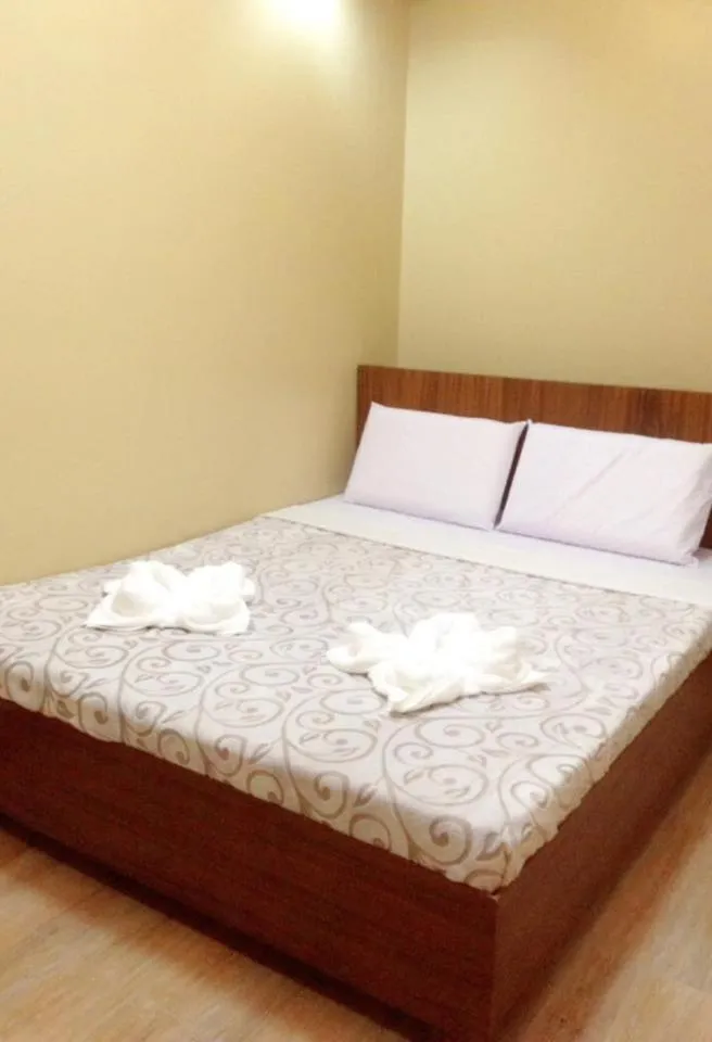 Bed in East Square Inn