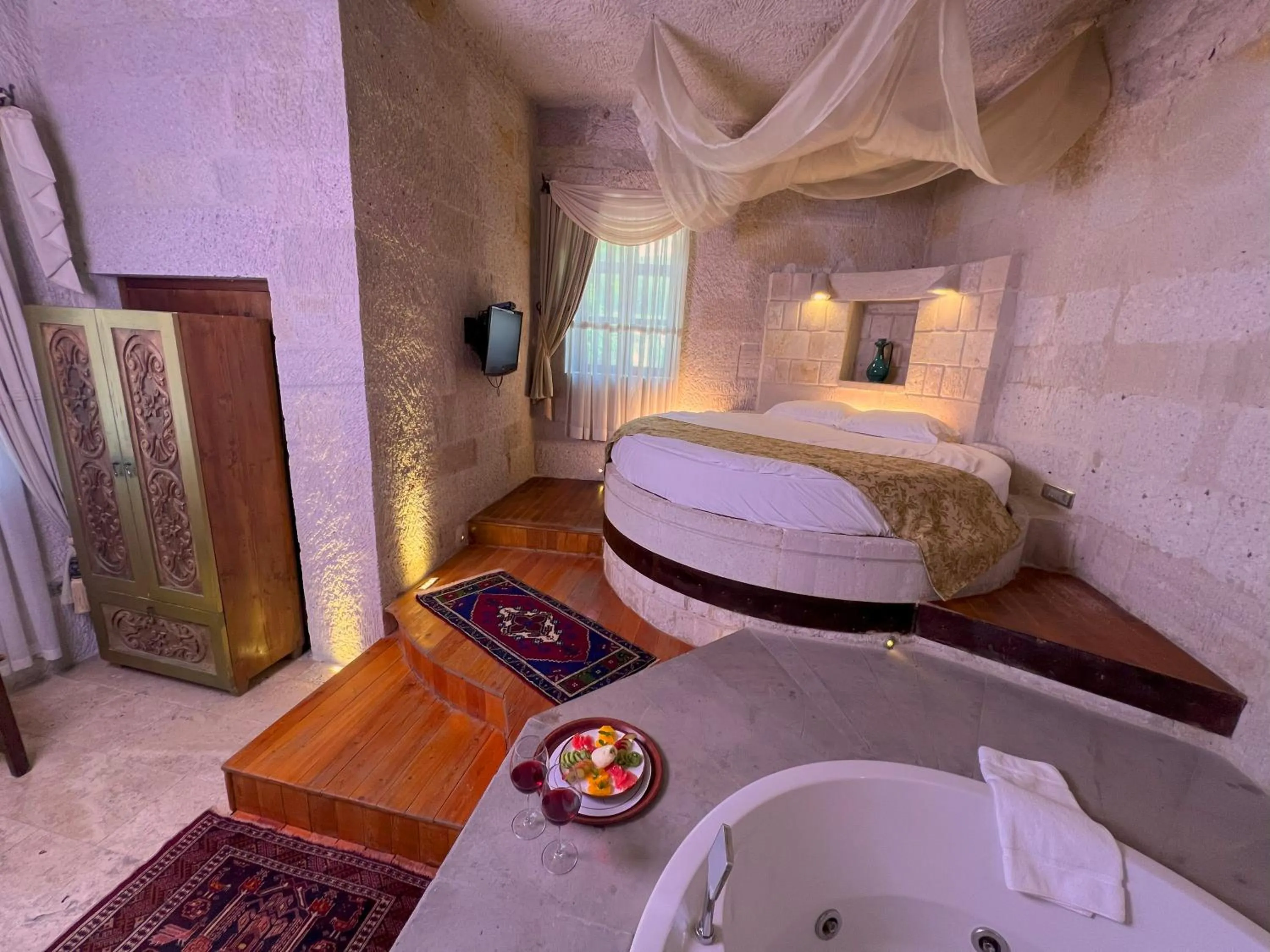 Bed in Anatolian Houses Cave Hotel & SPA