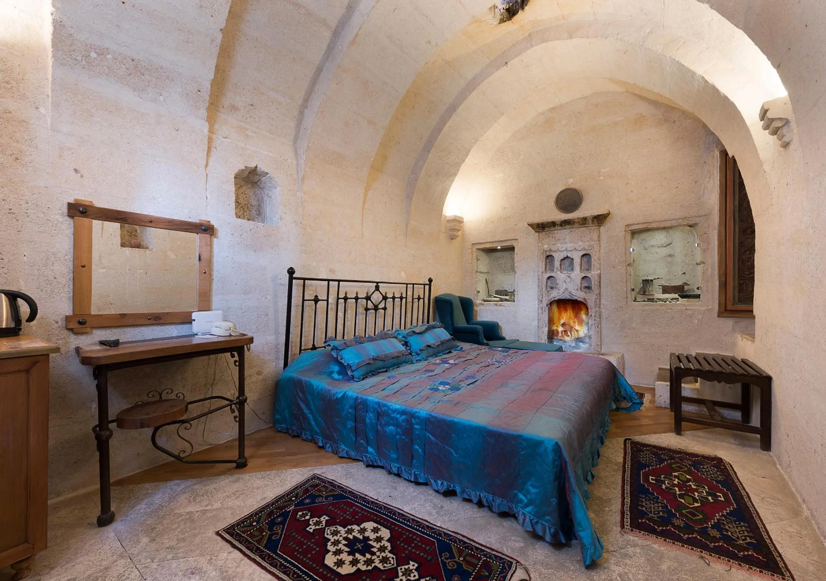 Bed in Anatolian Houses Cave Hotel & SPA