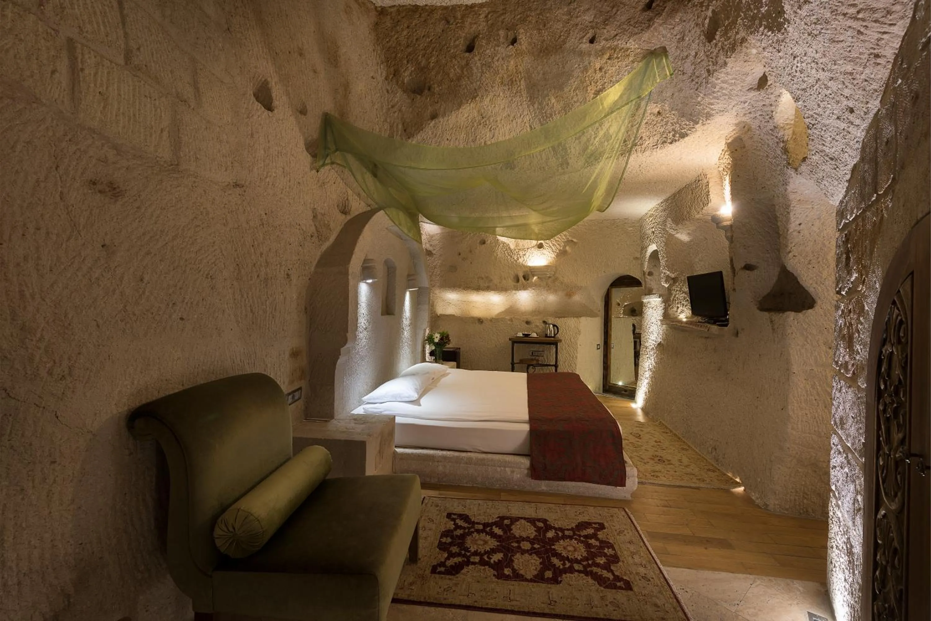 Bed in Anatolian Houses Cave Hotel & SPA