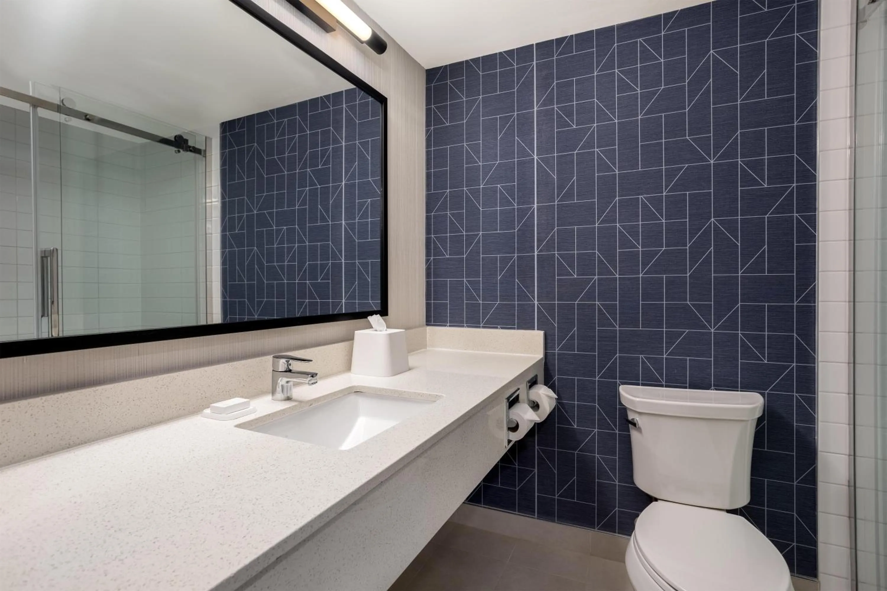 Bathroom in Spark by Hilton Toronto Mississauga