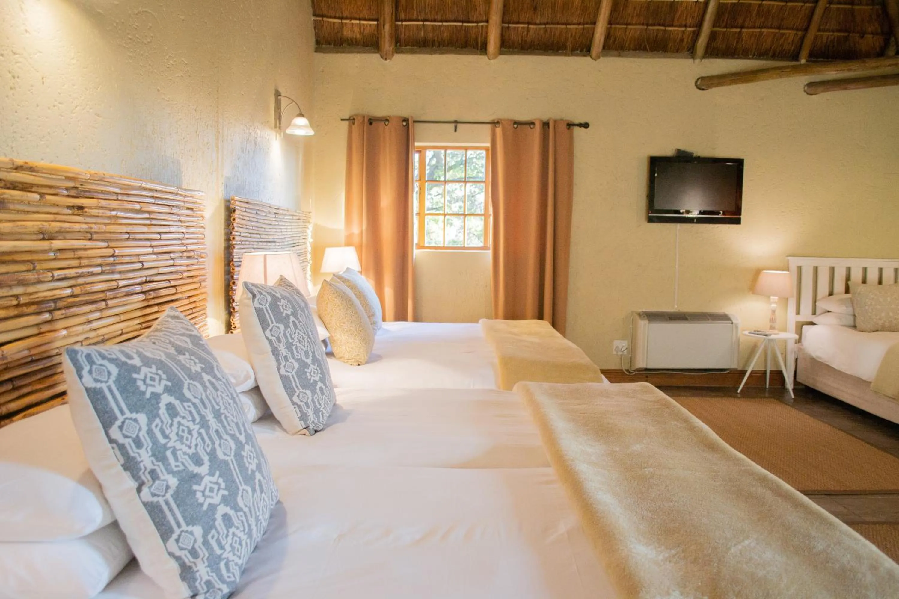 Bed in Safari Club Guest Lodge OR Tambo International Airport