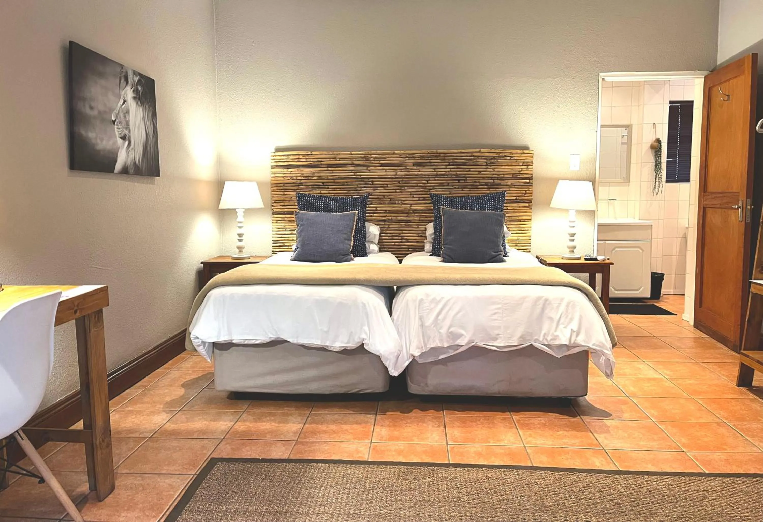 Bed in Safari Club Guest Lodge OR Tambo International Airport