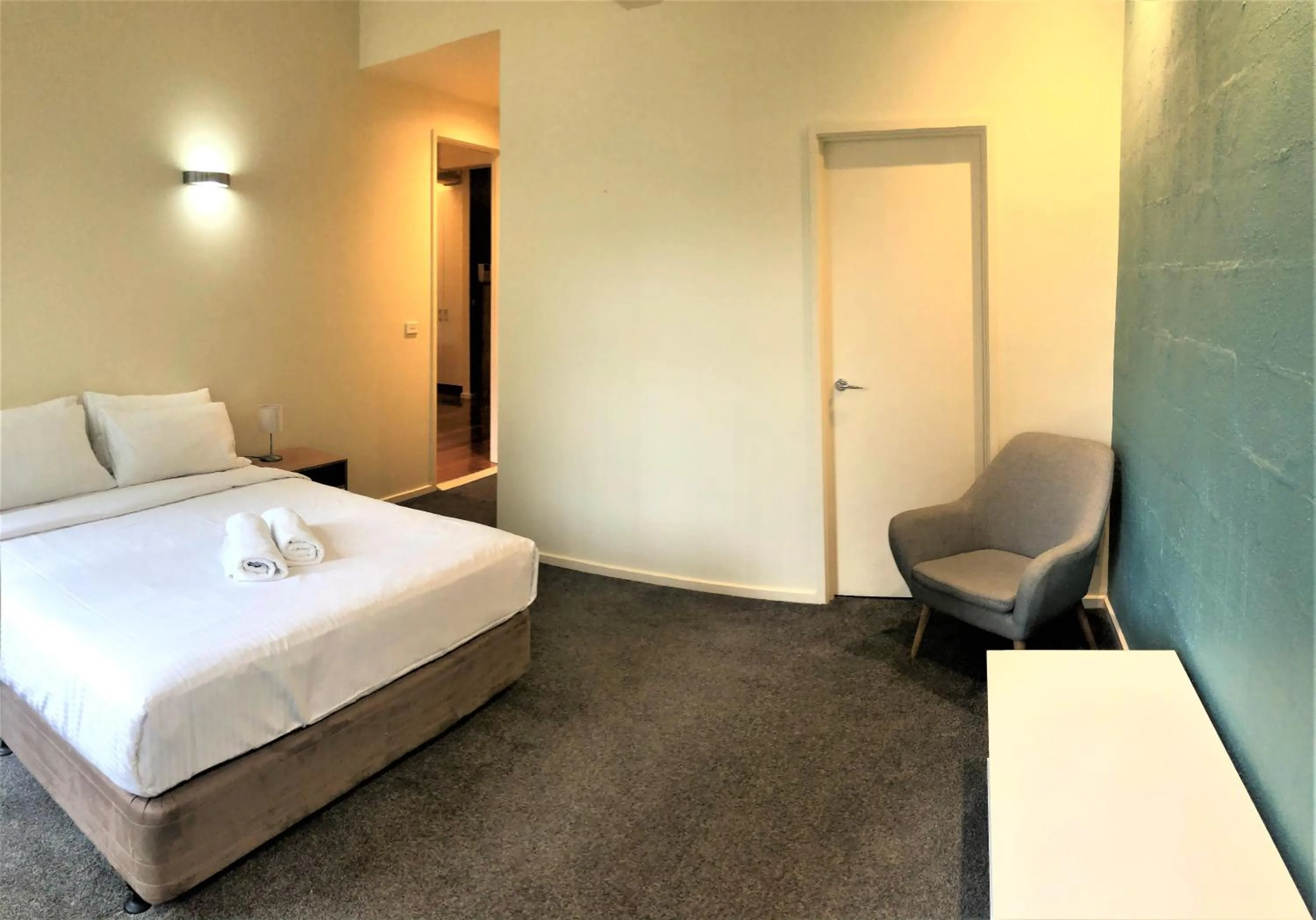 Bedroom, Bed in ReadySet Apartments on King