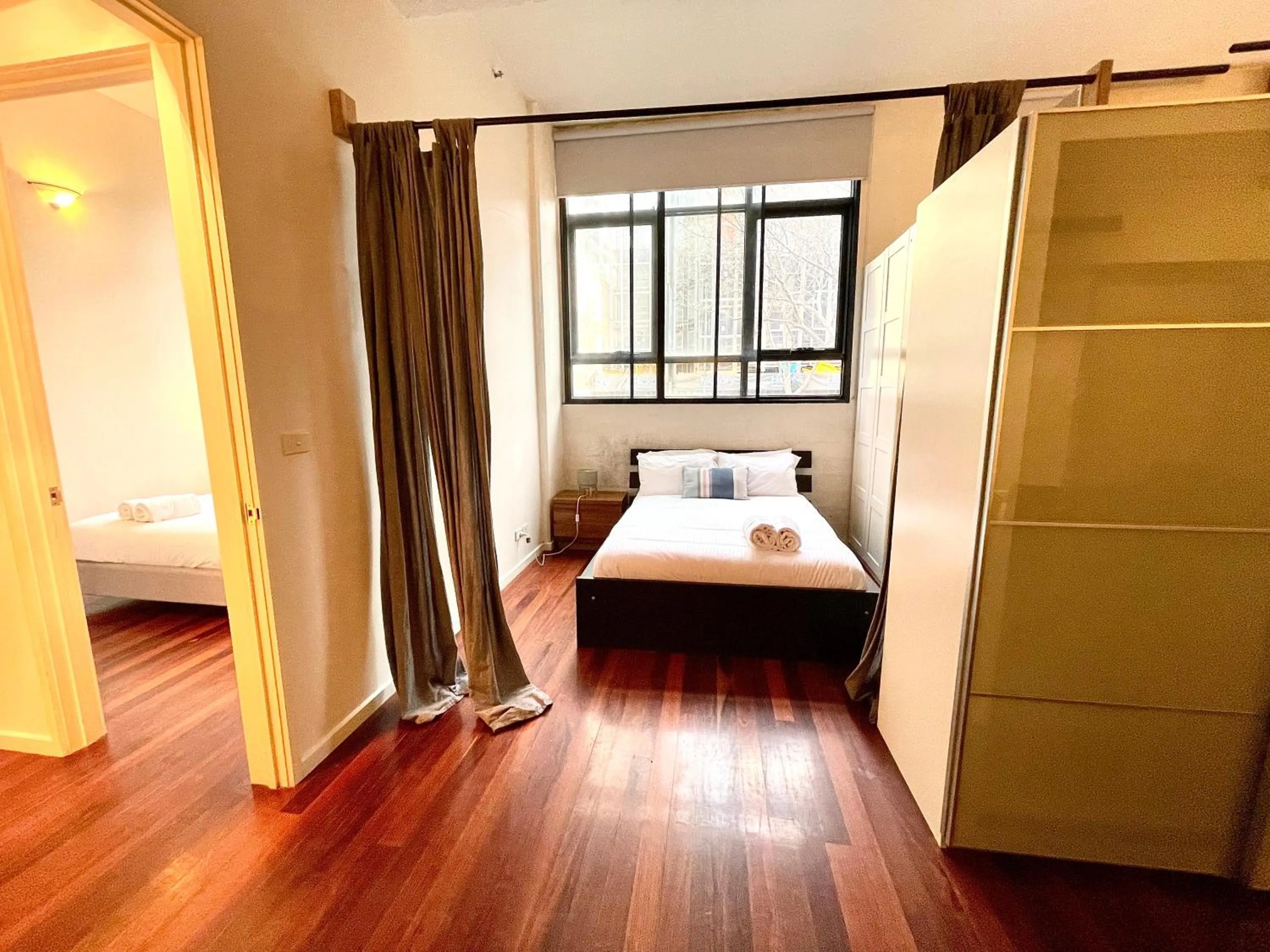 Bedroom, Bed in ReadySet Apartments on King