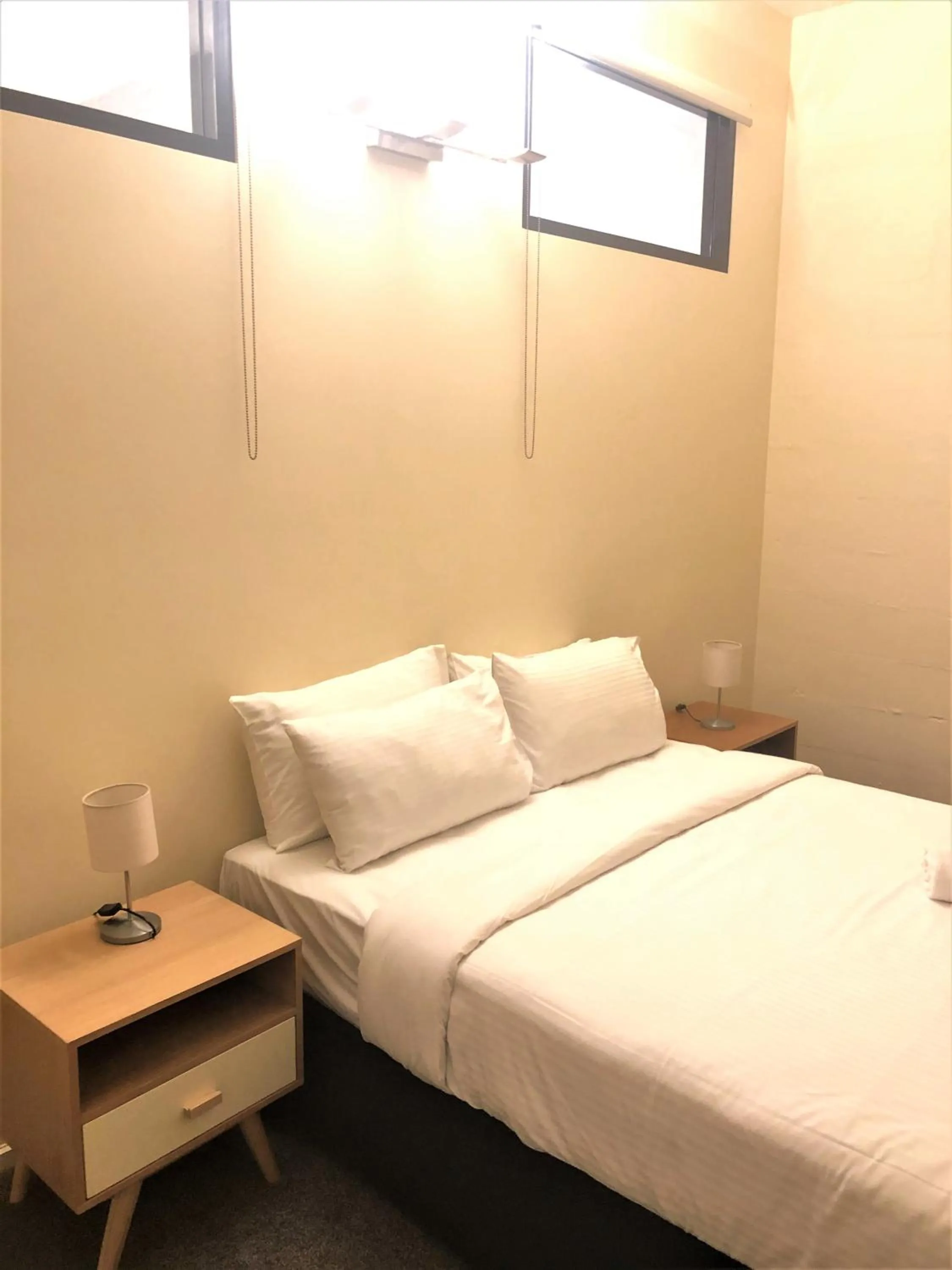 Bed in ReadySet Apartments on King