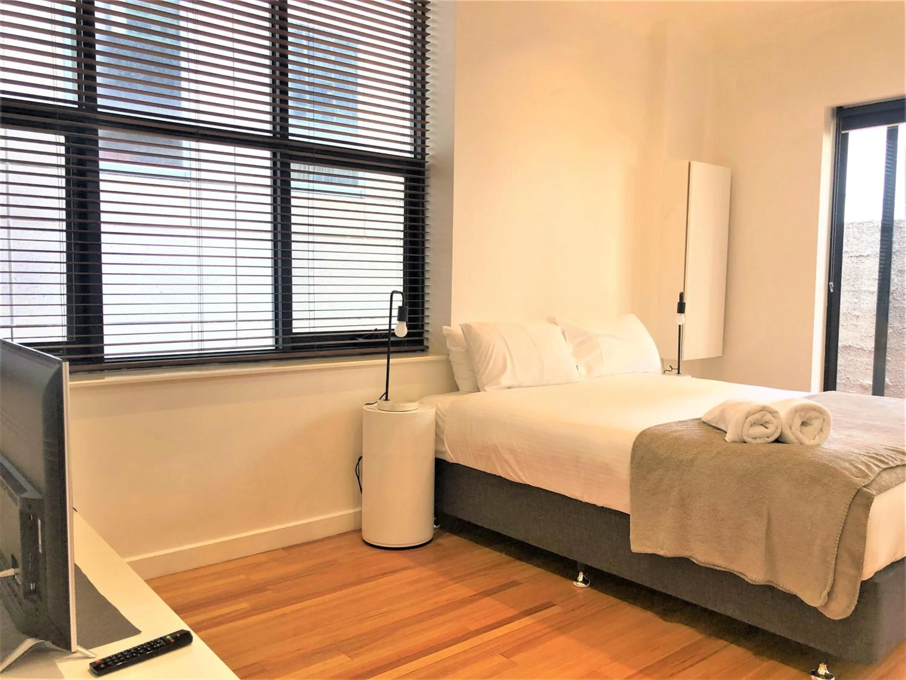 Bedroom, Bed in ReadySet Apartments on King