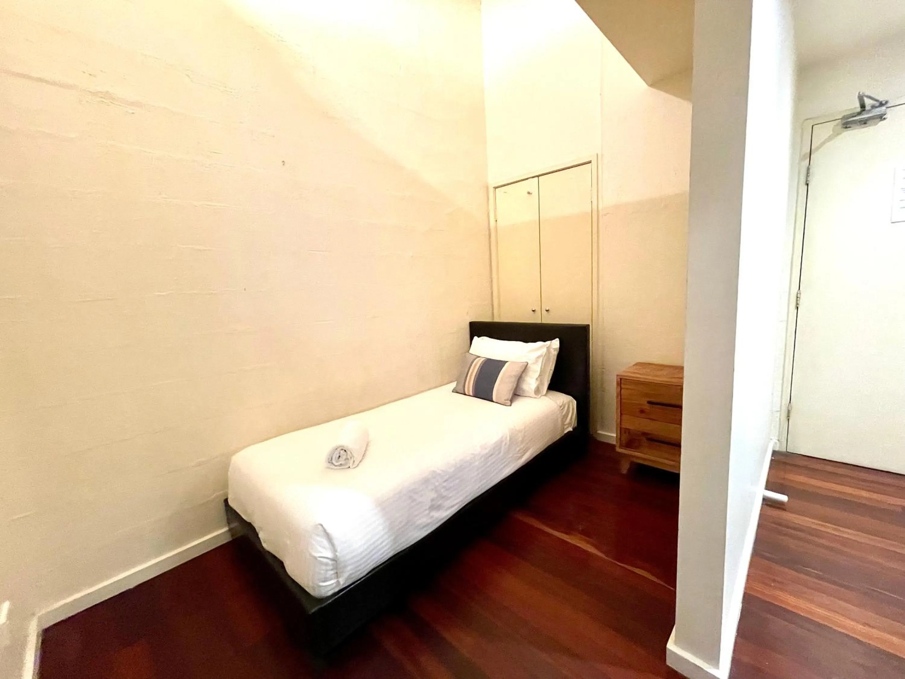 Bedroom, Bed in ReadySet Apartments on King