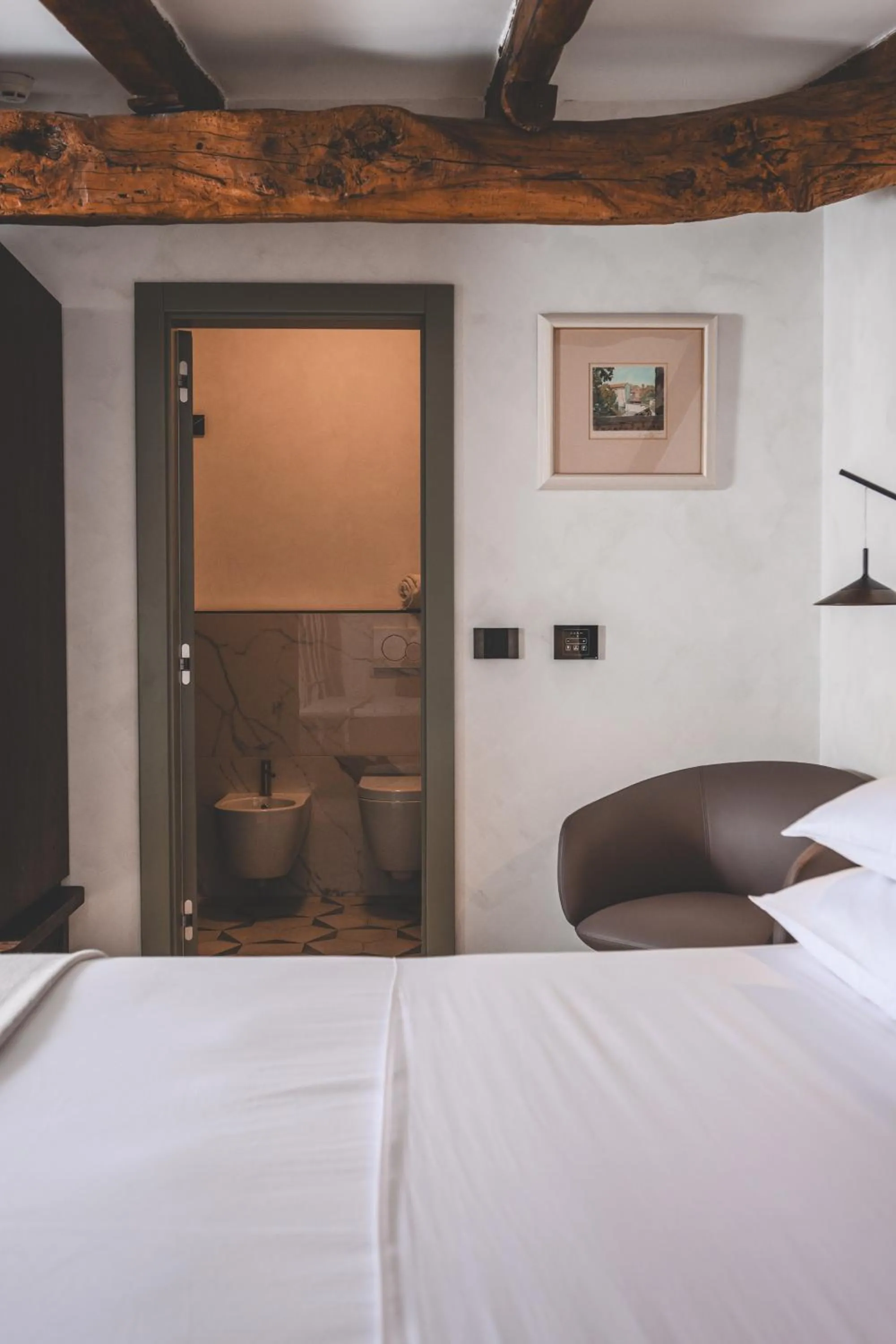 Bed in Boutique Hotel San Rocco