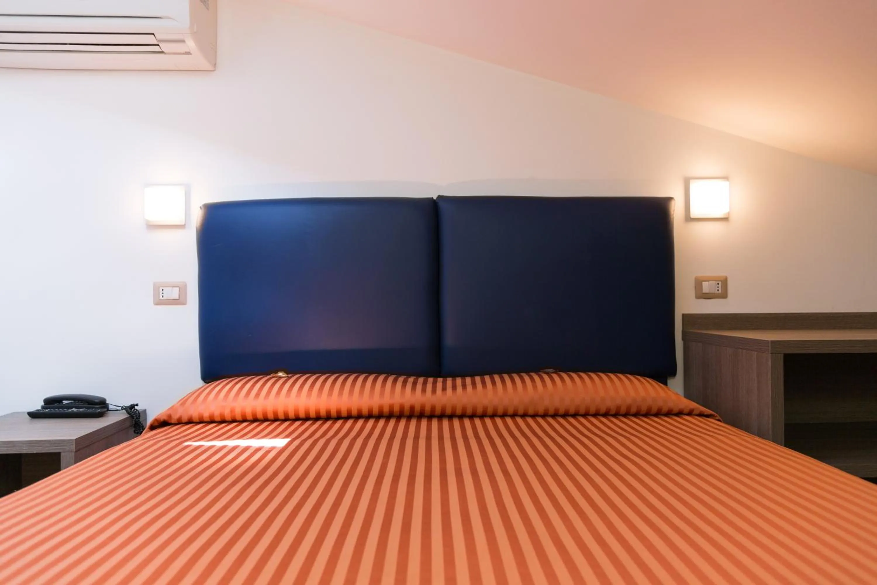 Bed in Hotel Miramare