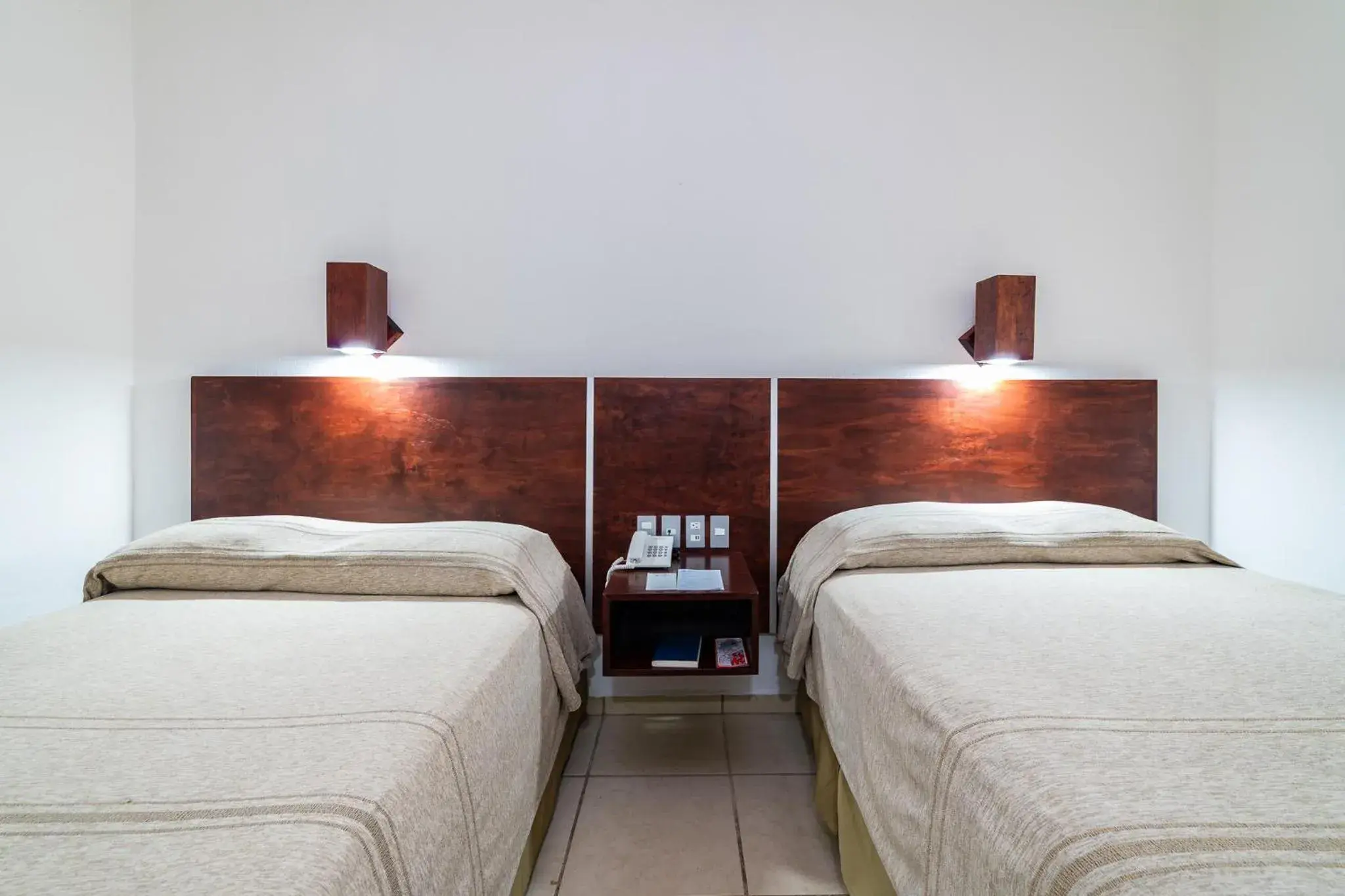 Bed in Hotel Castillo Huatulco & Beach Club Bed in Hotel Castillo Huatulco & Beach Club