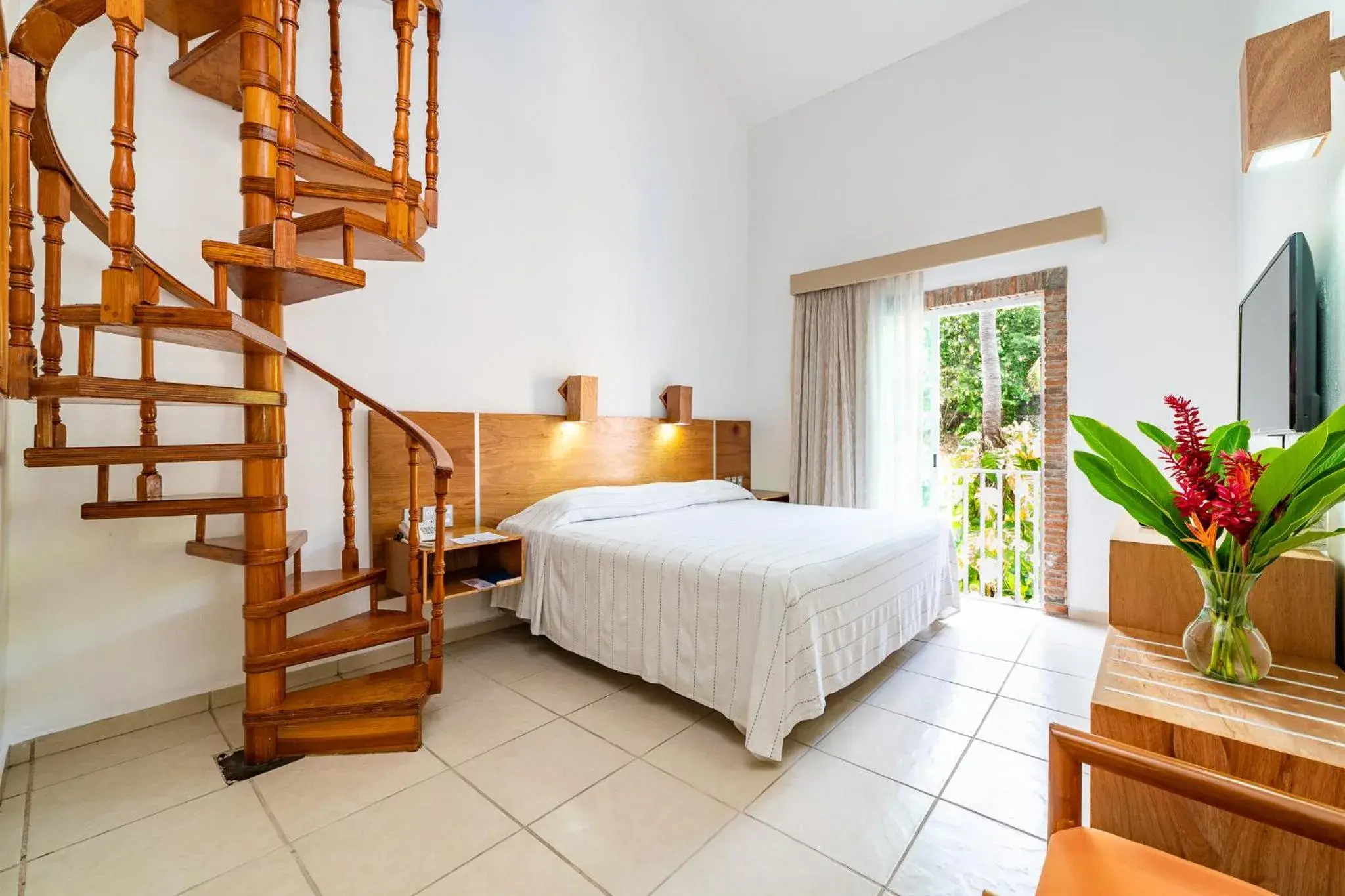 Bedroom, Bed in Hotel Castillo Huatulco & Beach Club Bedroom, Bed in Hotel Castillo Huatulco & Beach Club