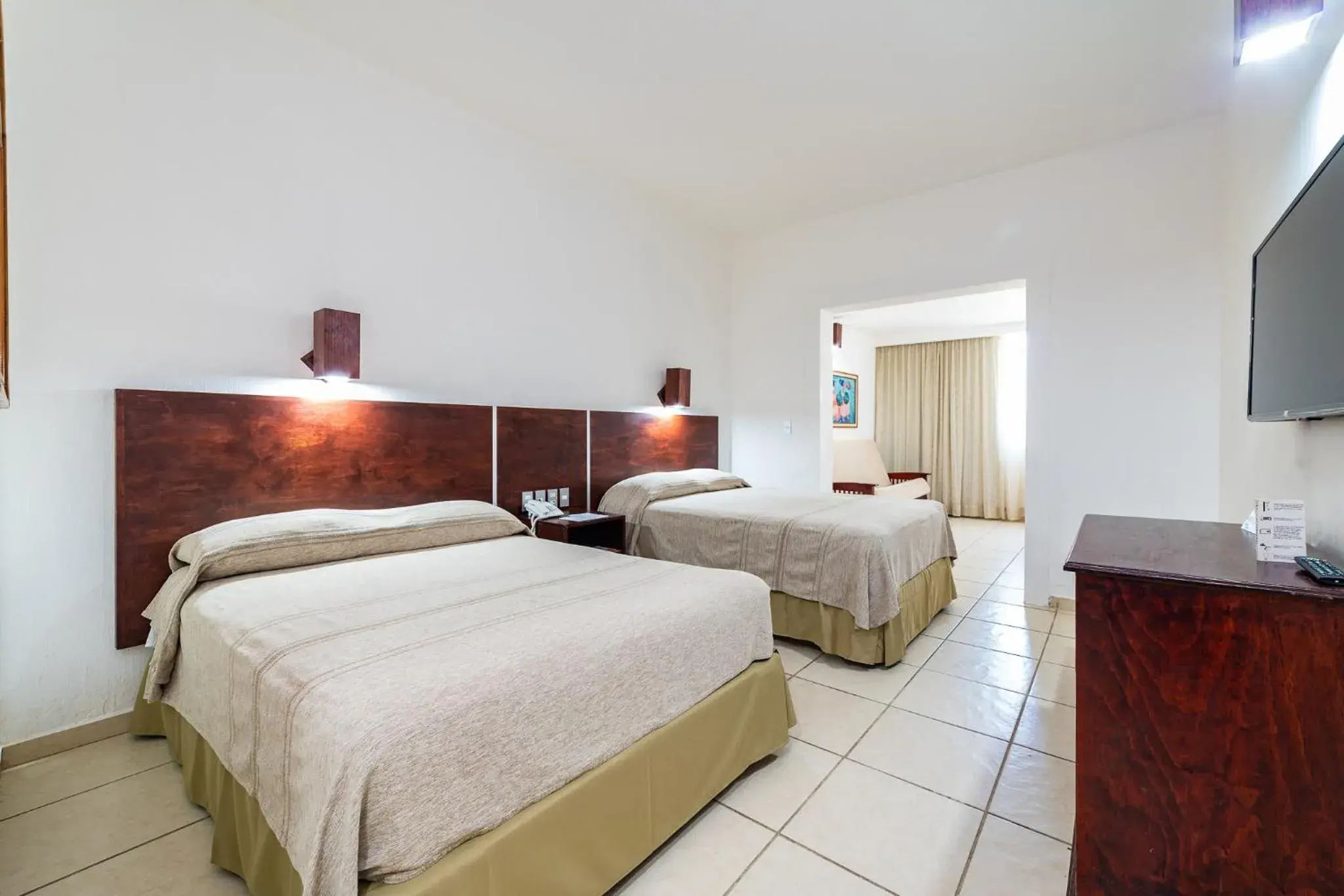 Bed in Hotel Castillo Huatulco & Beach Club Bed in Hotel Castillo Huatulco & Beach Club