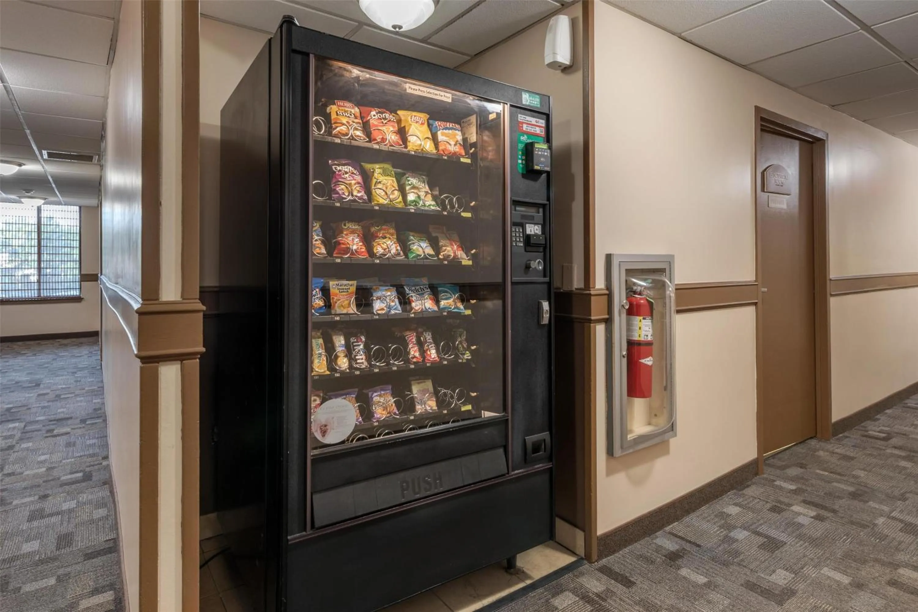 Property building in SureStay Hotel by Best Western East Brunswick