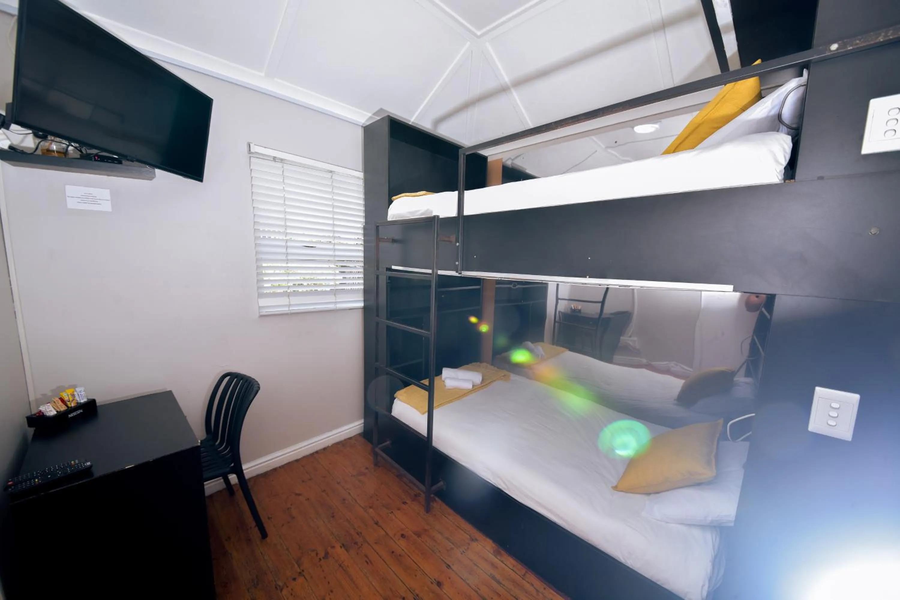 Photo of the whole room, Bed in Luxury Backpackers