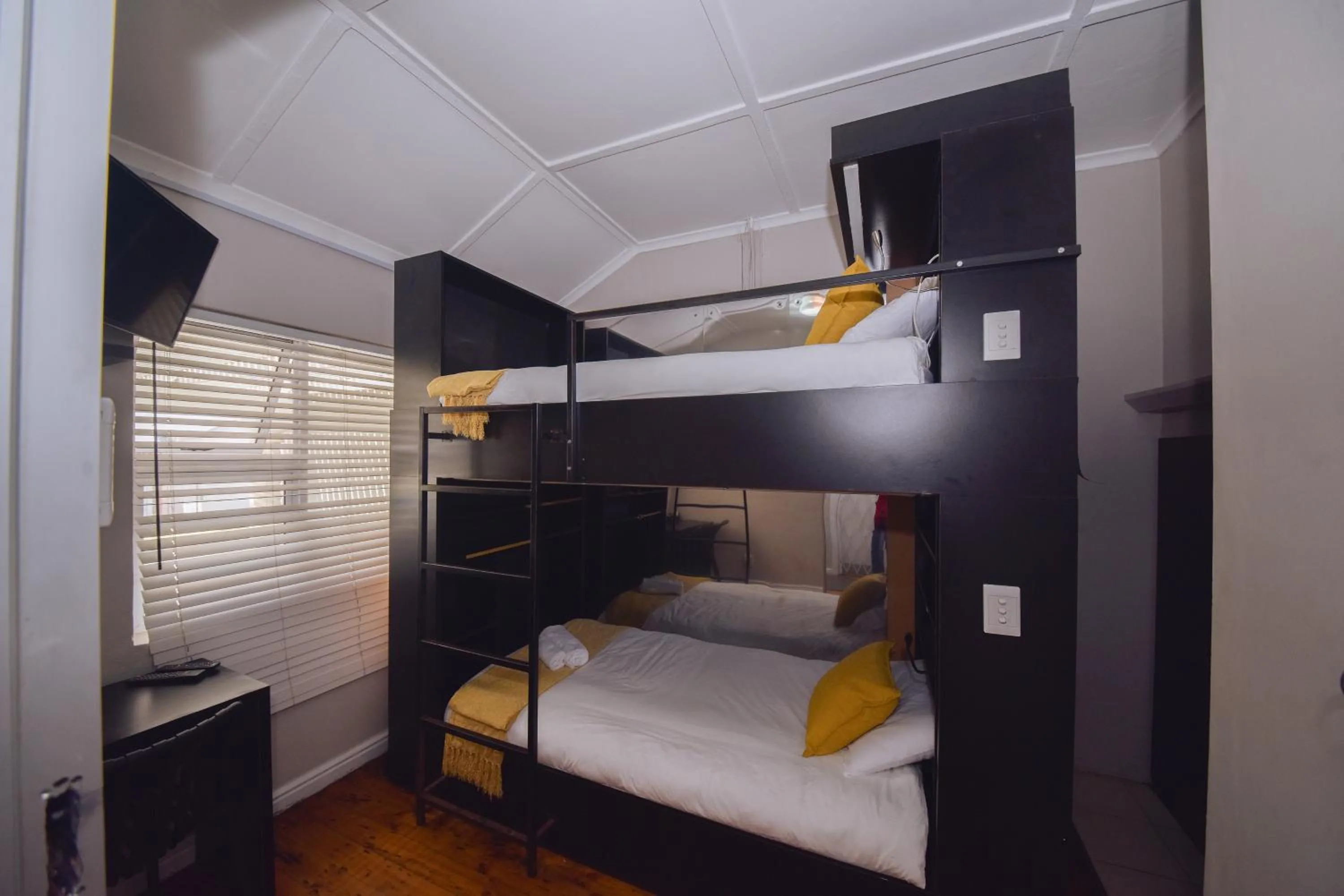 Photo of the whole room, Bed in Luxury Backpackers