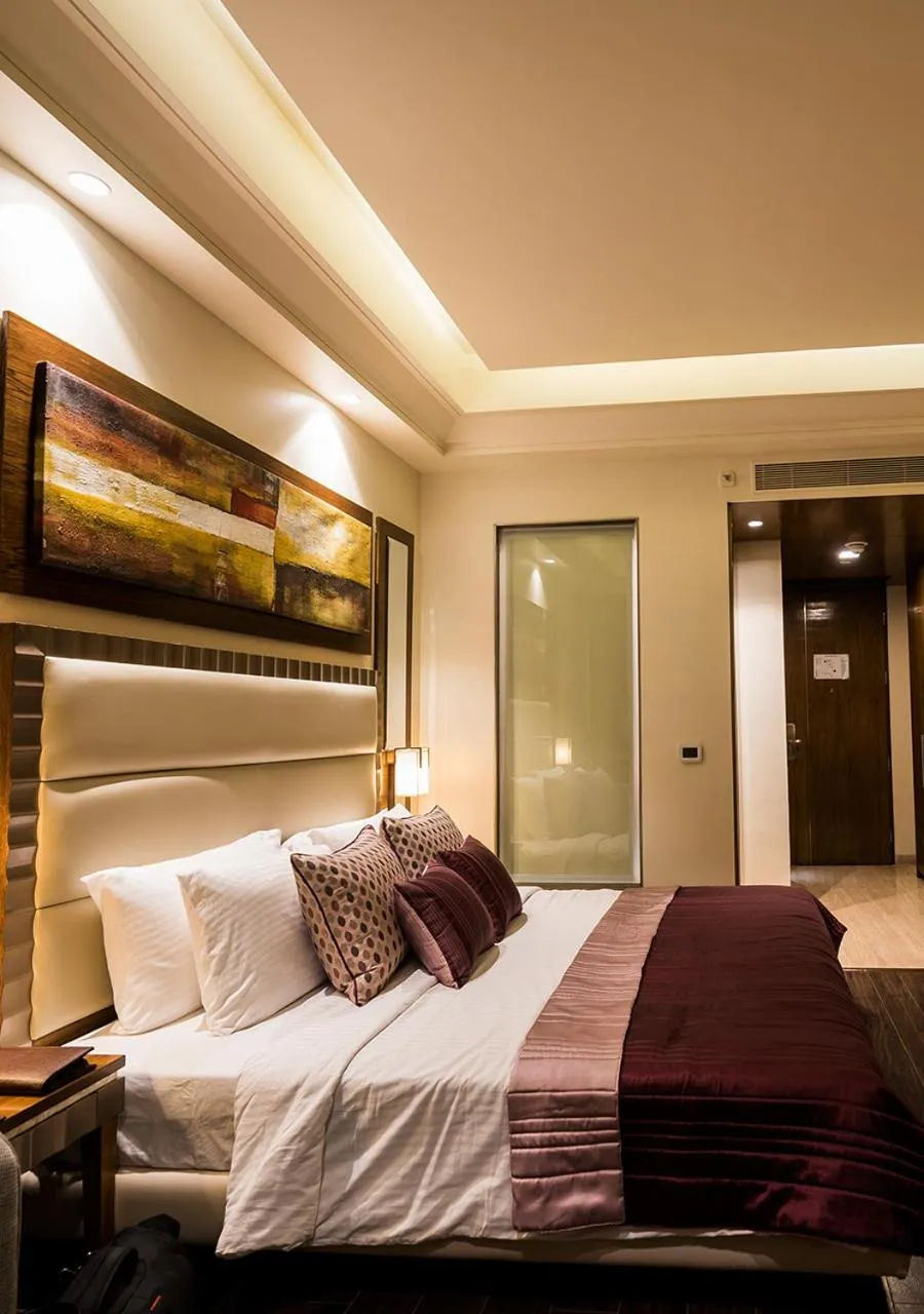 Photo of the whole room, Bed in Ramada Gurgaon Central