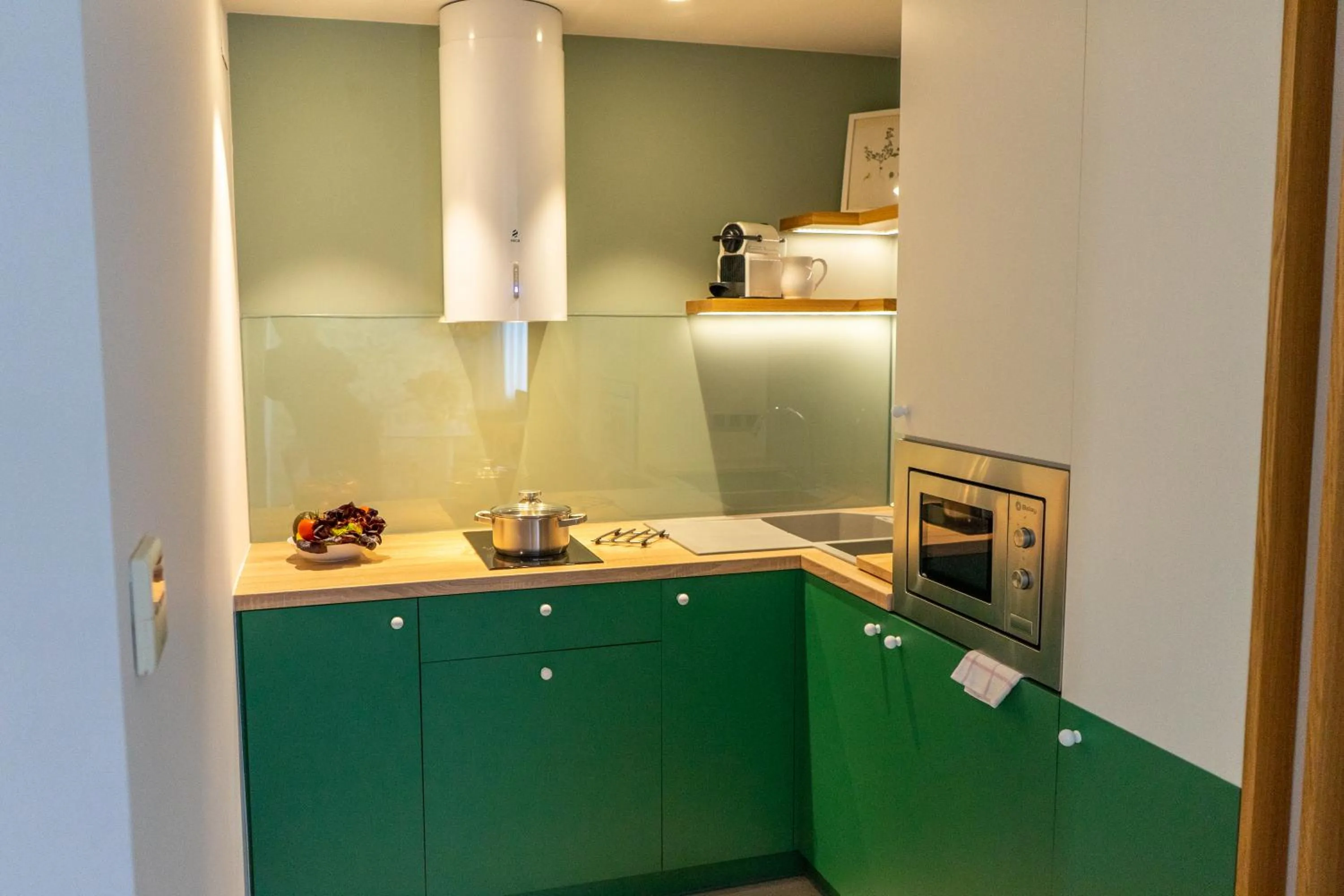 Kitchen or kitchenette in Apartamentos Porta Coeli