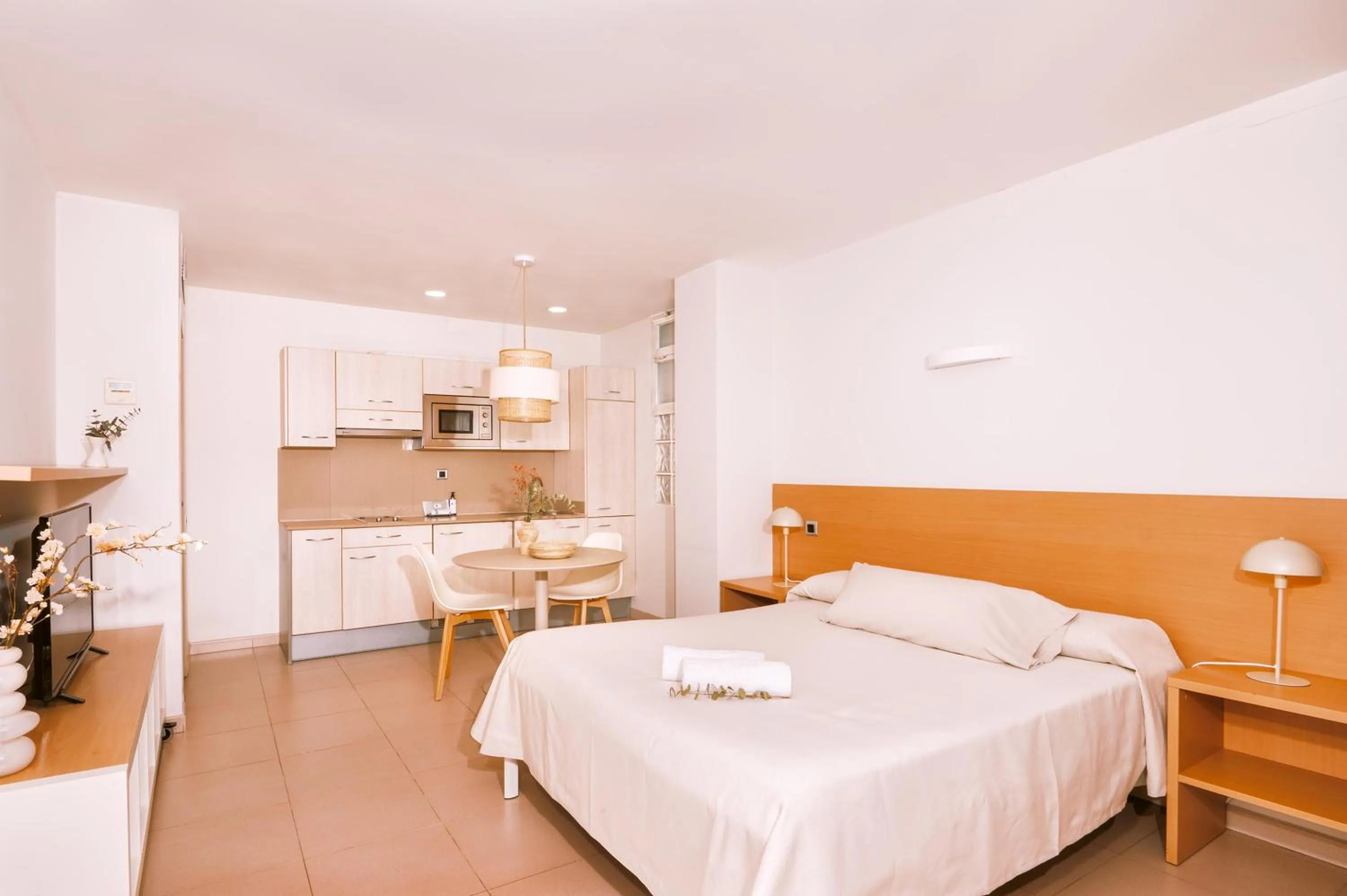 Bed in Apartamentos Porta Coeli