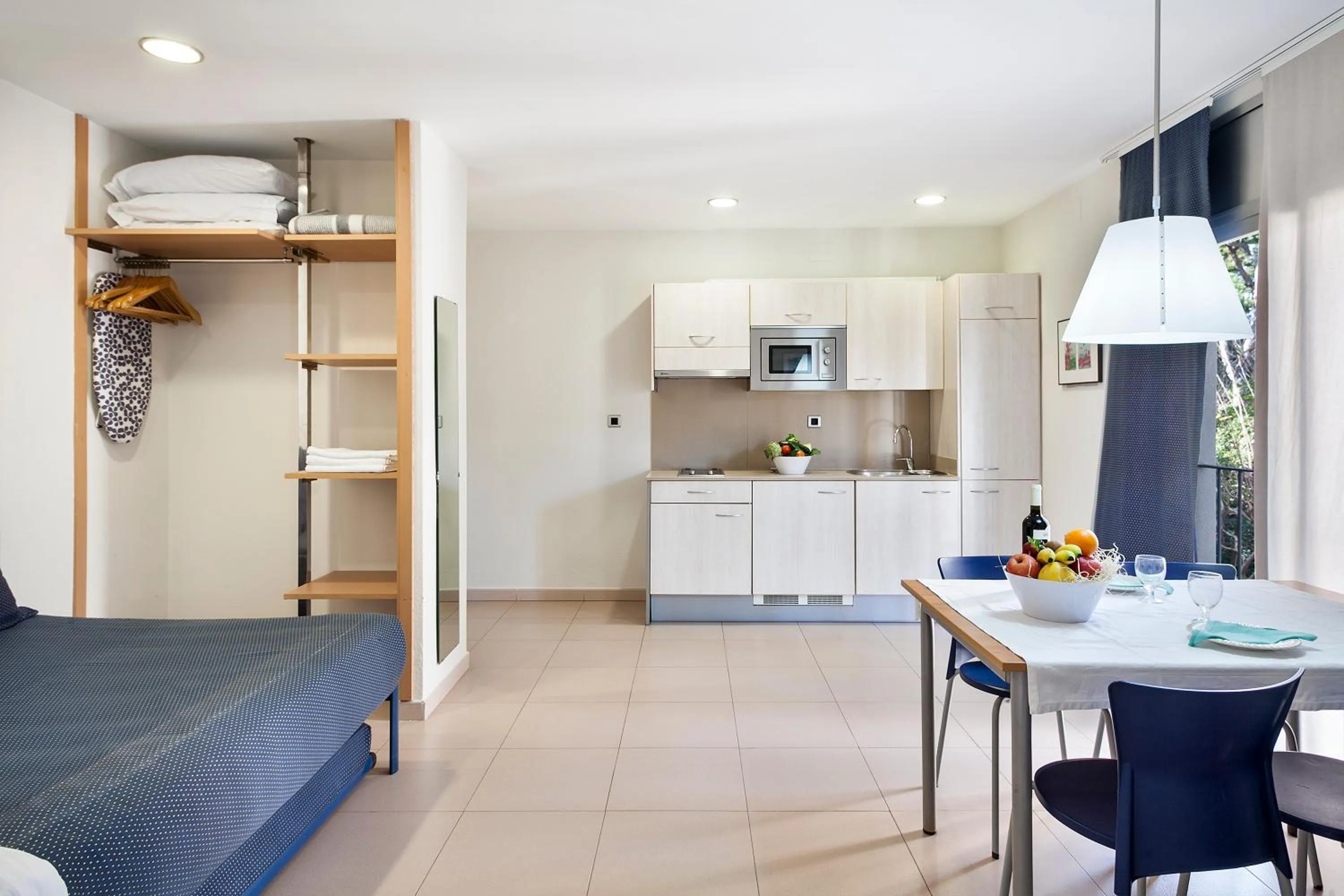 Kitchen or kitchenette in Apartamentos Porta Coeli