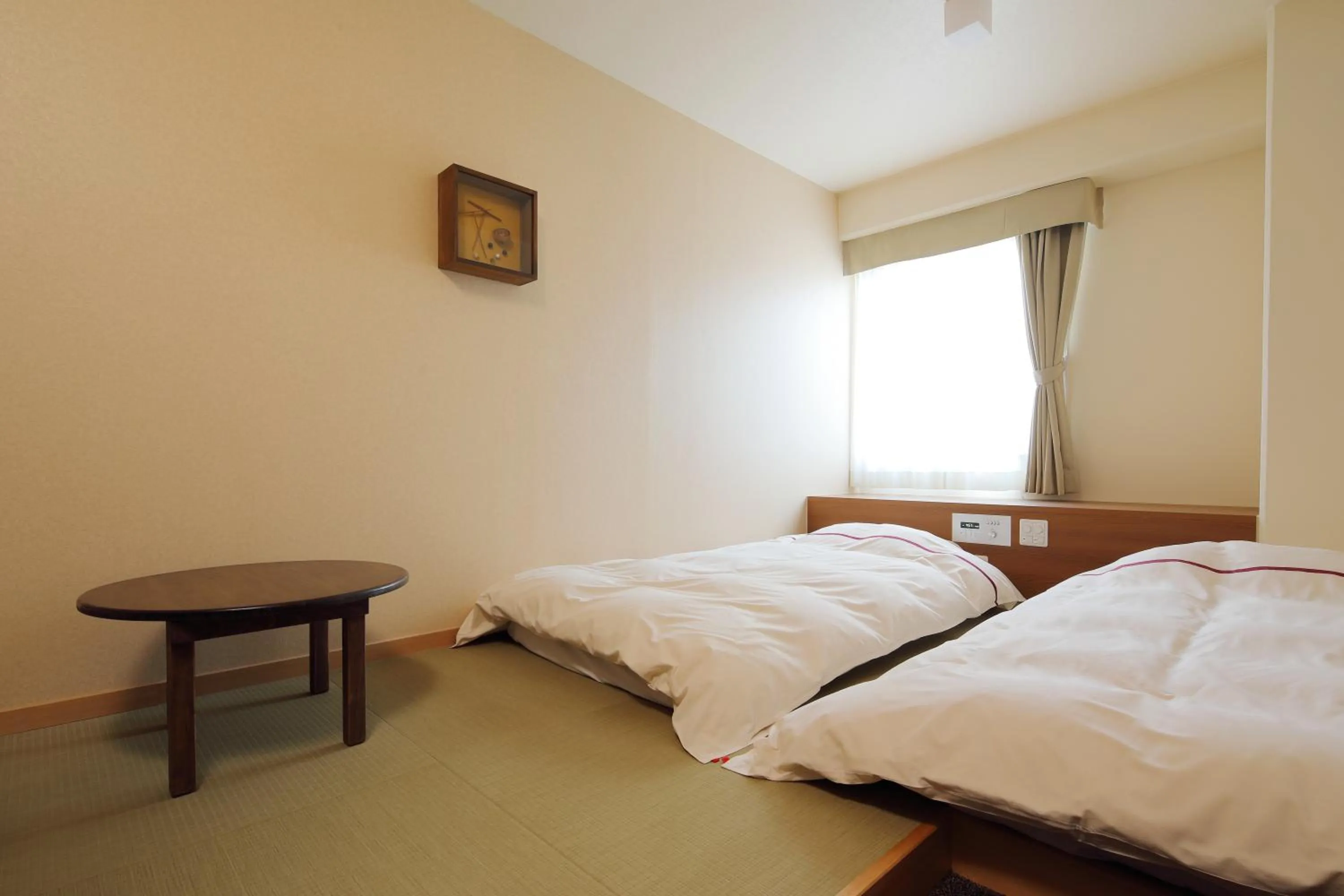 Bed in Okayama View Hotel
