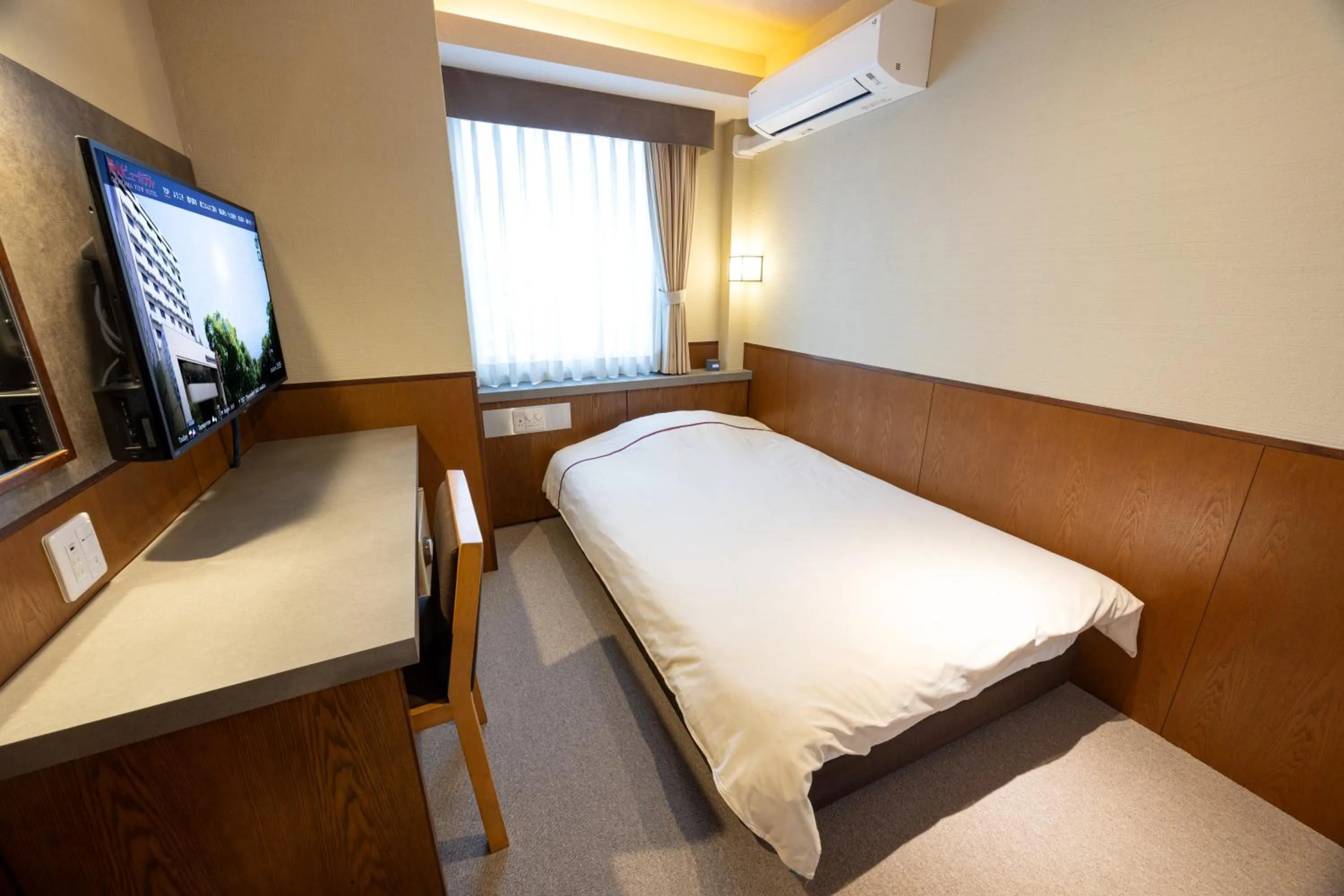 Bed in Okayama View Hotel