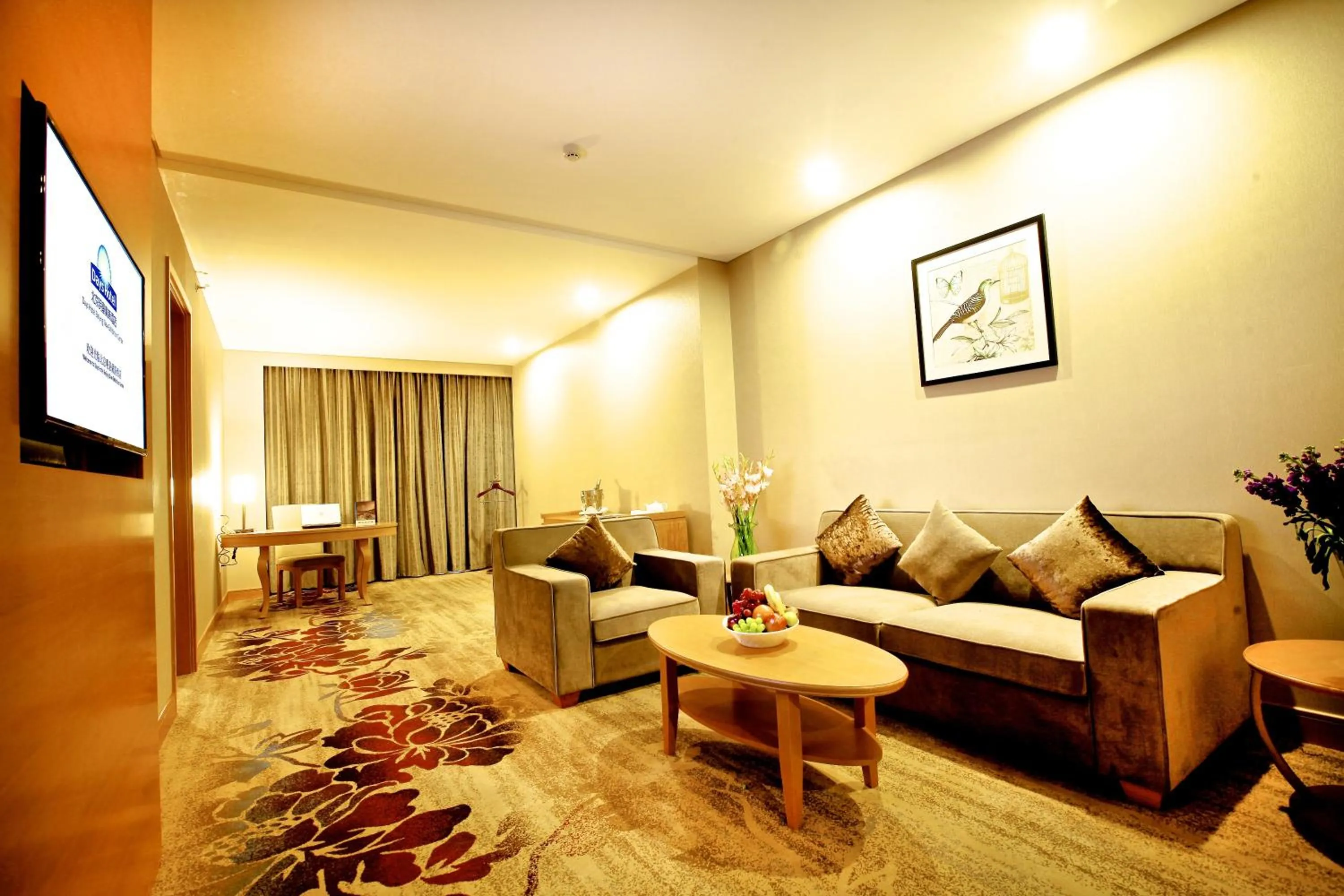 Seating area in Ramada by Wyndham Beijing Airport